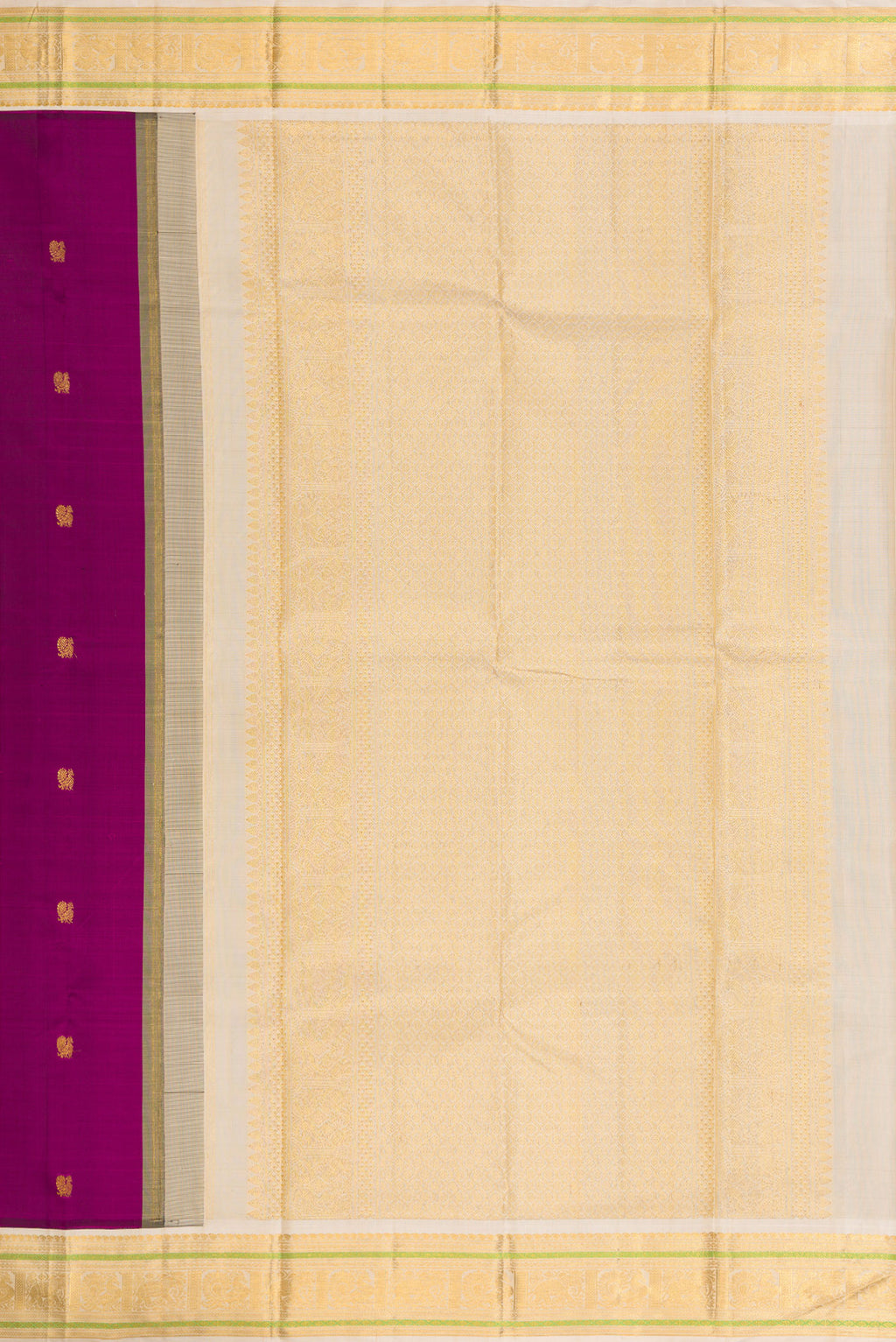 Close up image of the pallu of Pure Silk Pure Zari Magenta Dual Tone Kanjivaram Saree with Zari Butta on the body and Zari Border. 