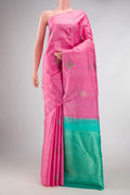 Pure Silk Pure Zari Pink Dual Tone Kanchipuram Saree with Zari And Thread Butta on the body and Without Border displayed on a mannequin