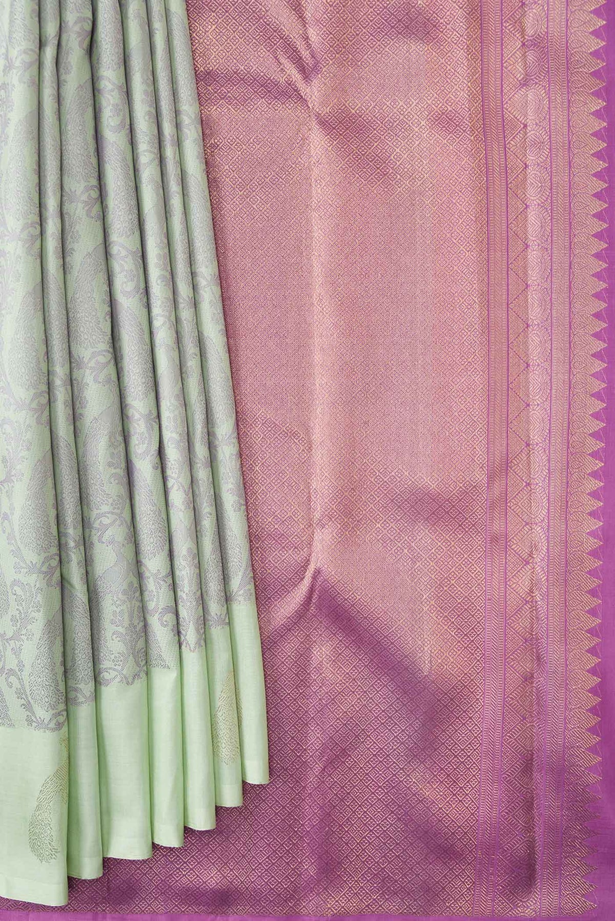 Pleats and pallu of Pista Green Dual Tone Kanchipuram Silk Saree with Jacquard design on the body and Fancy Border