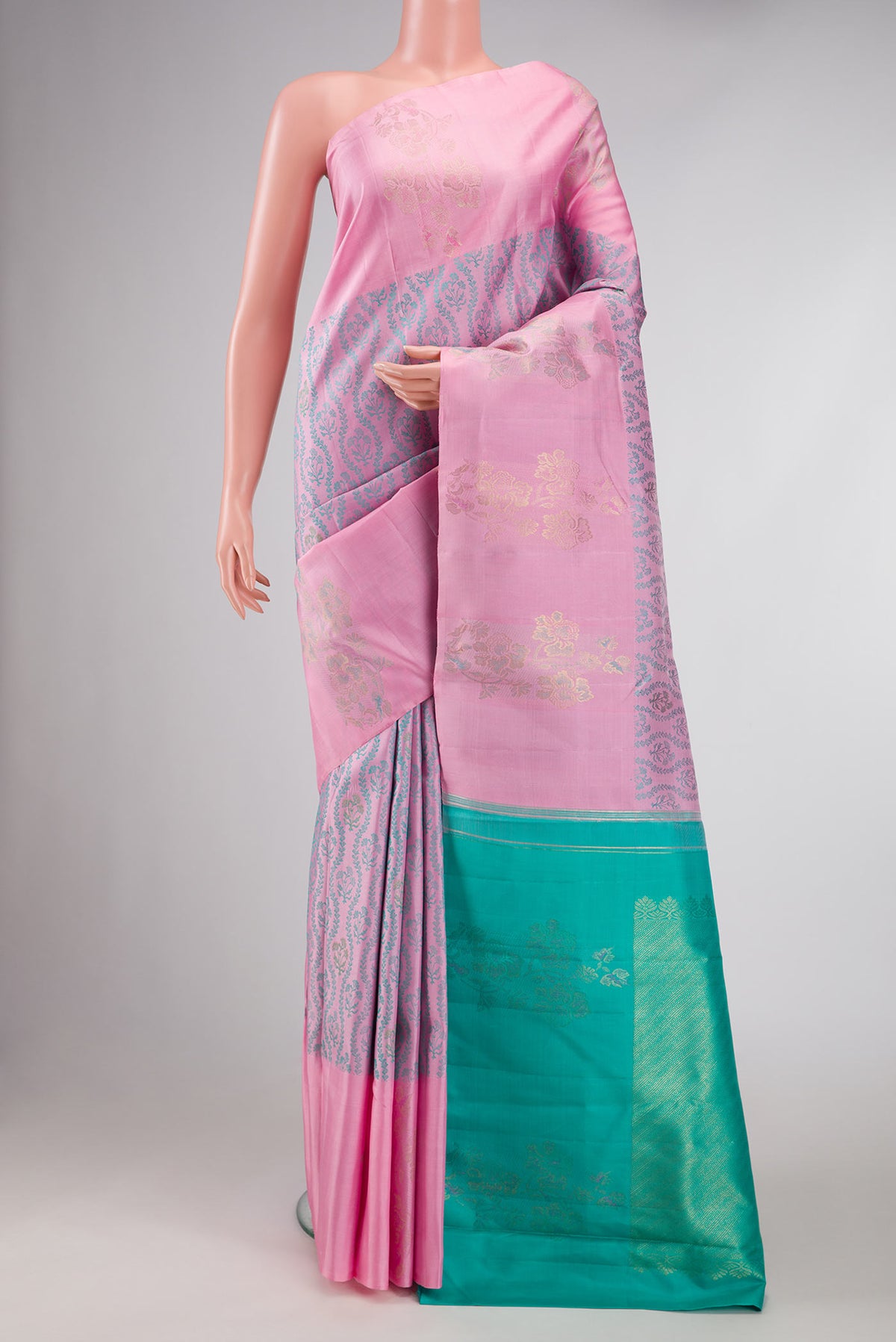 Pure Silk Pure Zari Pink Dual Tone Kanchipuram Saree with Jacquard design on the body and Fancy Border displayed on a mannequin