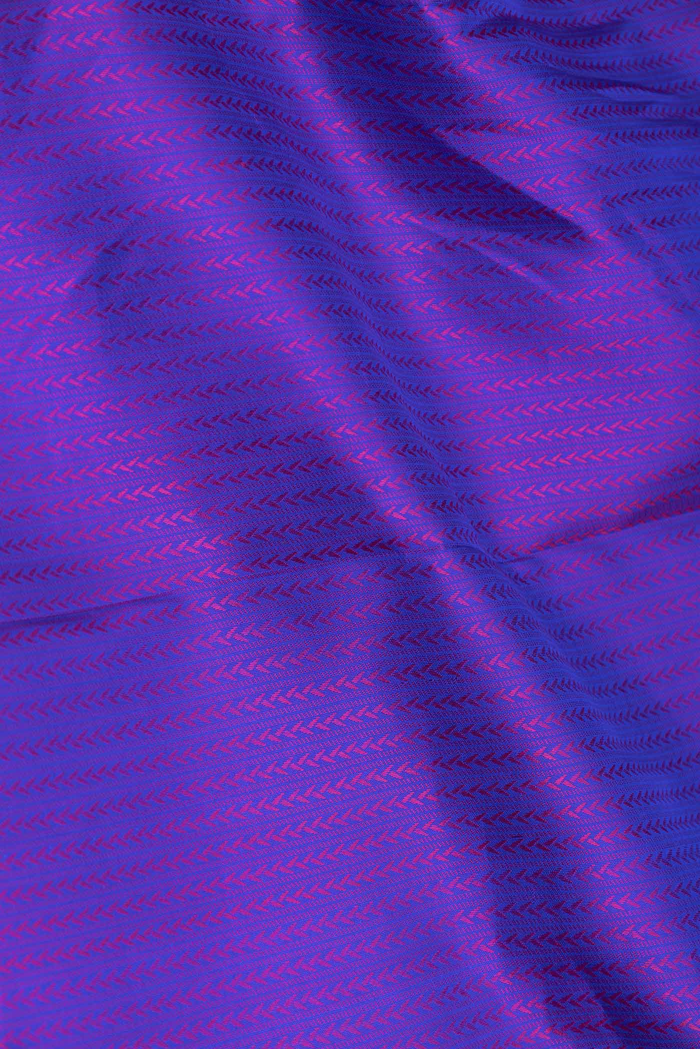 Close up of Royal Blue Dual Tone Kanchipuram Saree with Jacquard With Zari Butta on the body and Zari Border displaying folds