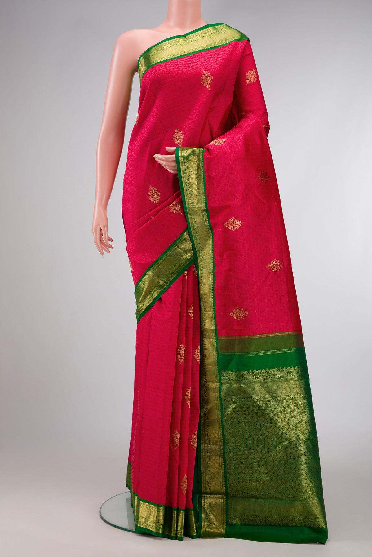 Pure Silk Pure Zari Pink Dual Tone Kanchipuram Saree with Jacquard With Zari Butta on the body and Zari Border.  displayed on a mannequin