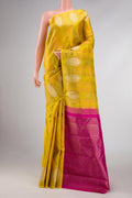 Yellow Dual Tone Kanchipuram Silk Saree with Jacquard design on the body and Fancy Border displayed on a mannequin