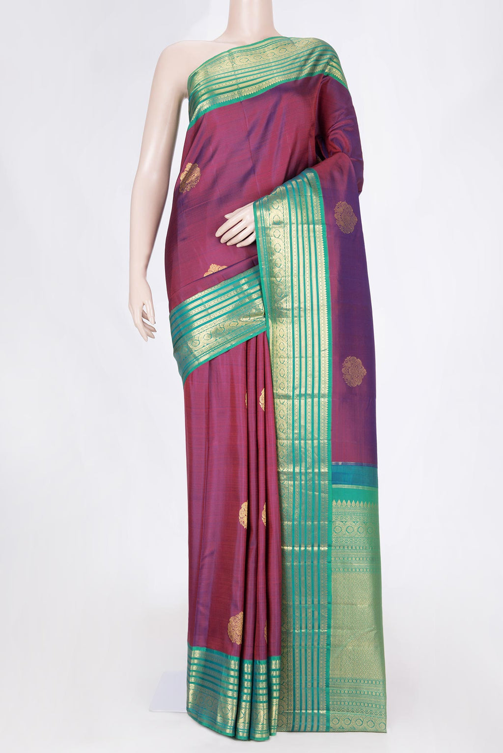 Purple Dual Tone Kanchipuram Silk Saree with Zari Butta on the body and Zari Border displayed on a mannequin