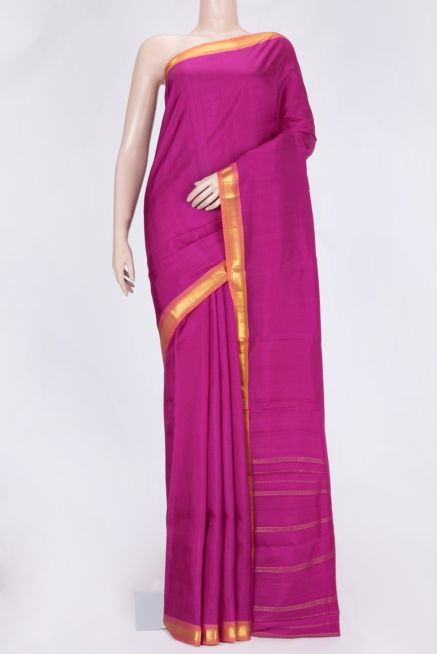 Magenta Dual Tone Kanjivaram Saree with Plain Body and Zari Border.  displayed on a mannequin