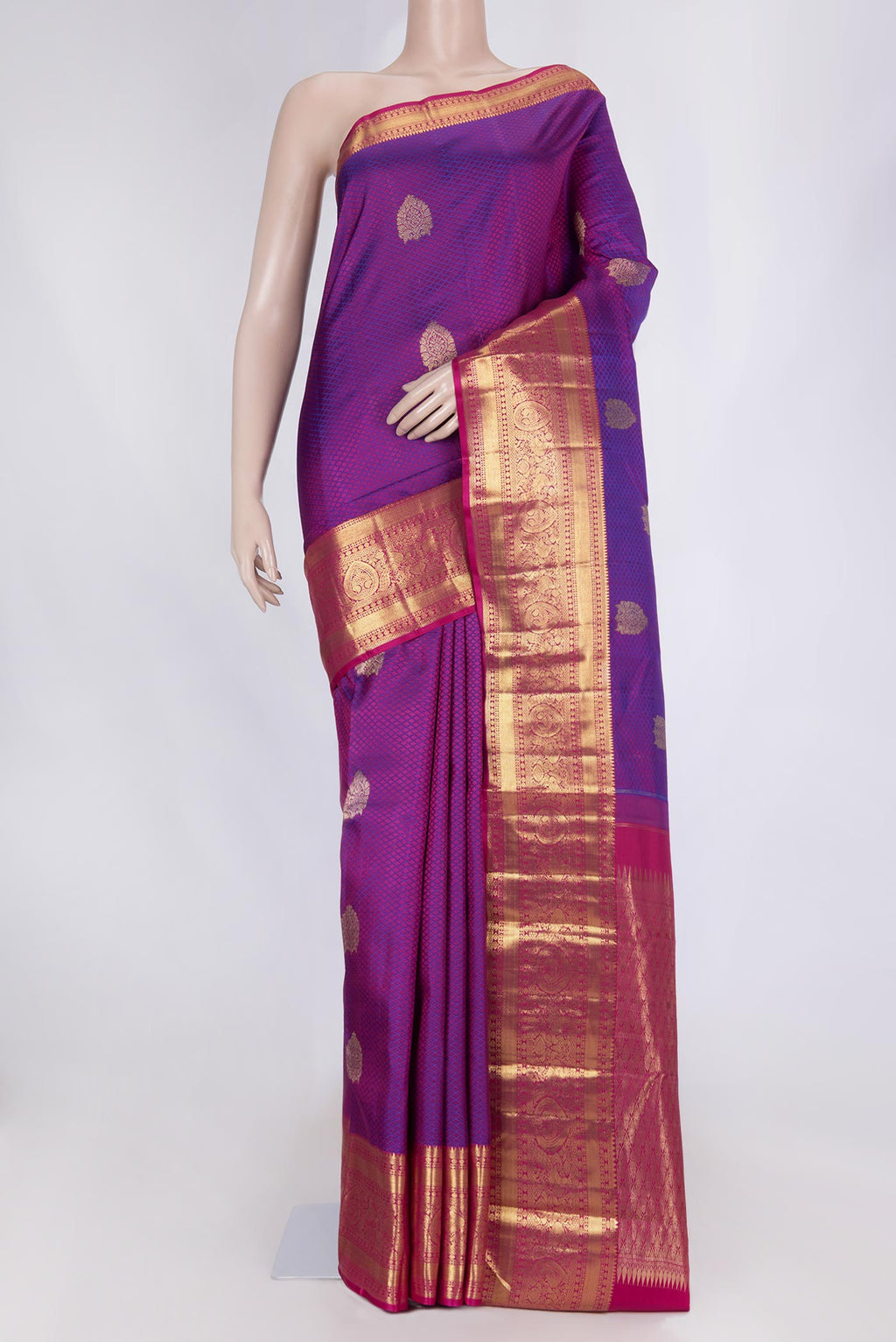 Purple Dual Tone Kanchipuram Saree with Jacquard With Zari Butta on the body and Zari Border displayed on a mannequin