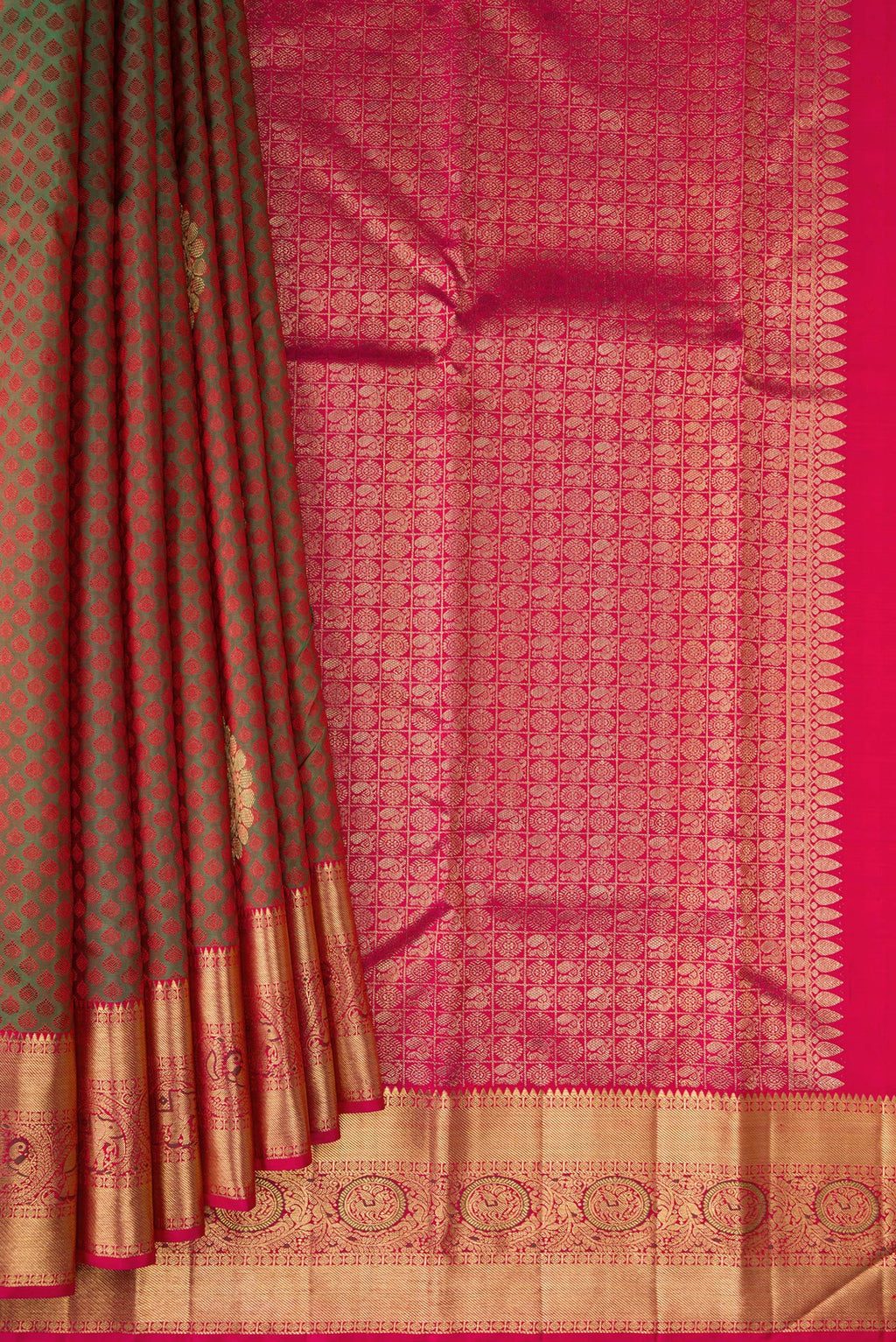 Pleats and pallu of Mehandi Green Dual Tone Kanchipuram Silk Saree with Jacquard With Zari Butta on the body and Zari Border. 