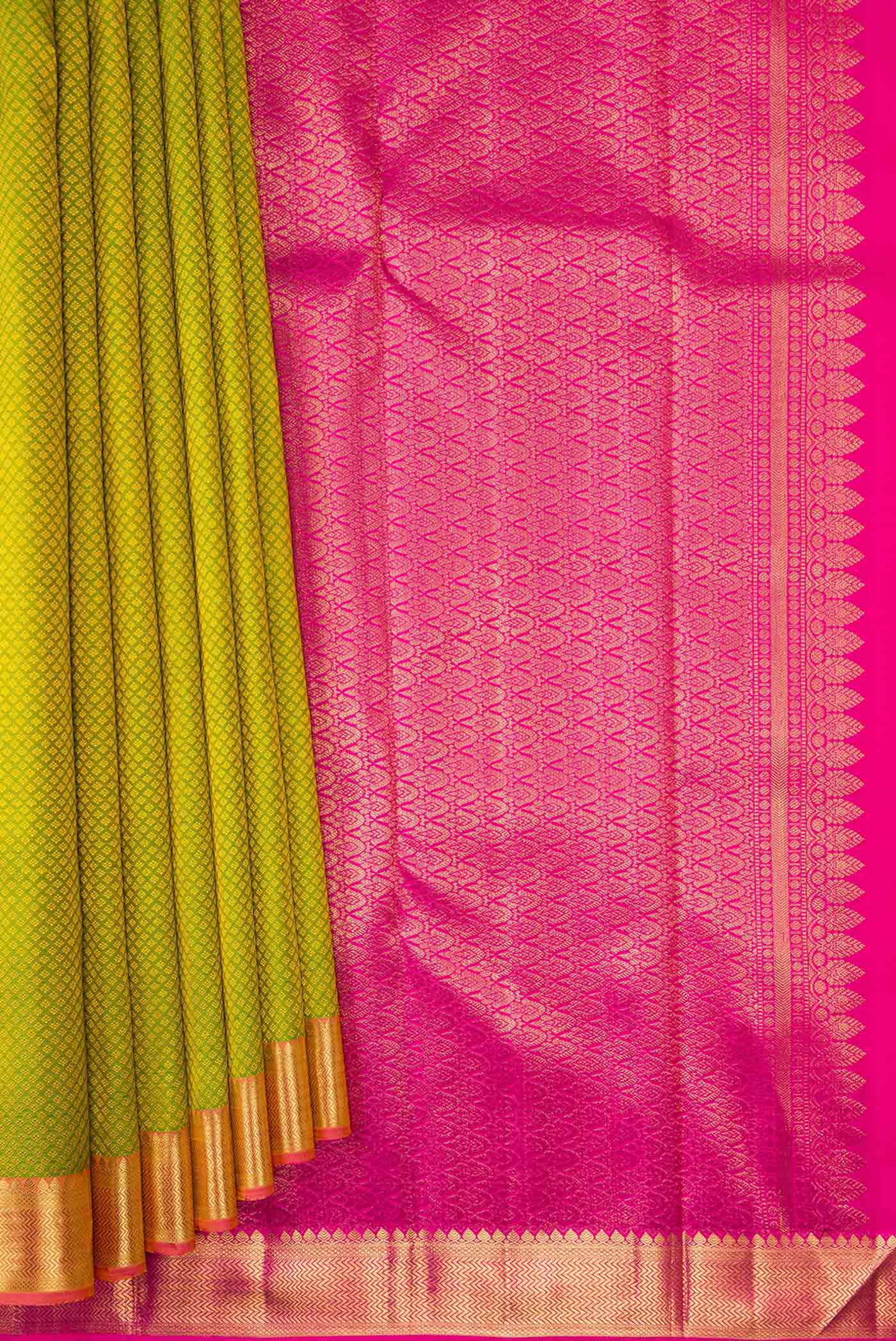 Pleats and pallu of Pure Silk Pure Zari Parrot Green Dual Tone Kanjivaram Saree with Jacquard design on the body and Zari Border. 