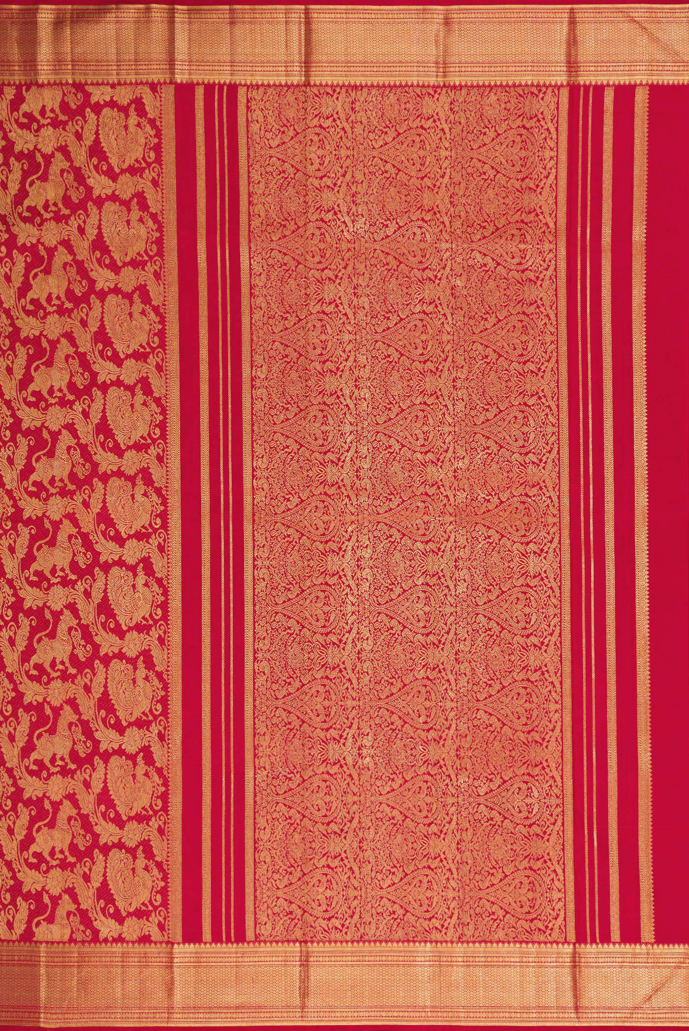 Close up image of the pallu of Maroon Dual Tone Kanchipuram Silk Saree with Zari Brocade on the body and Zari Border. 