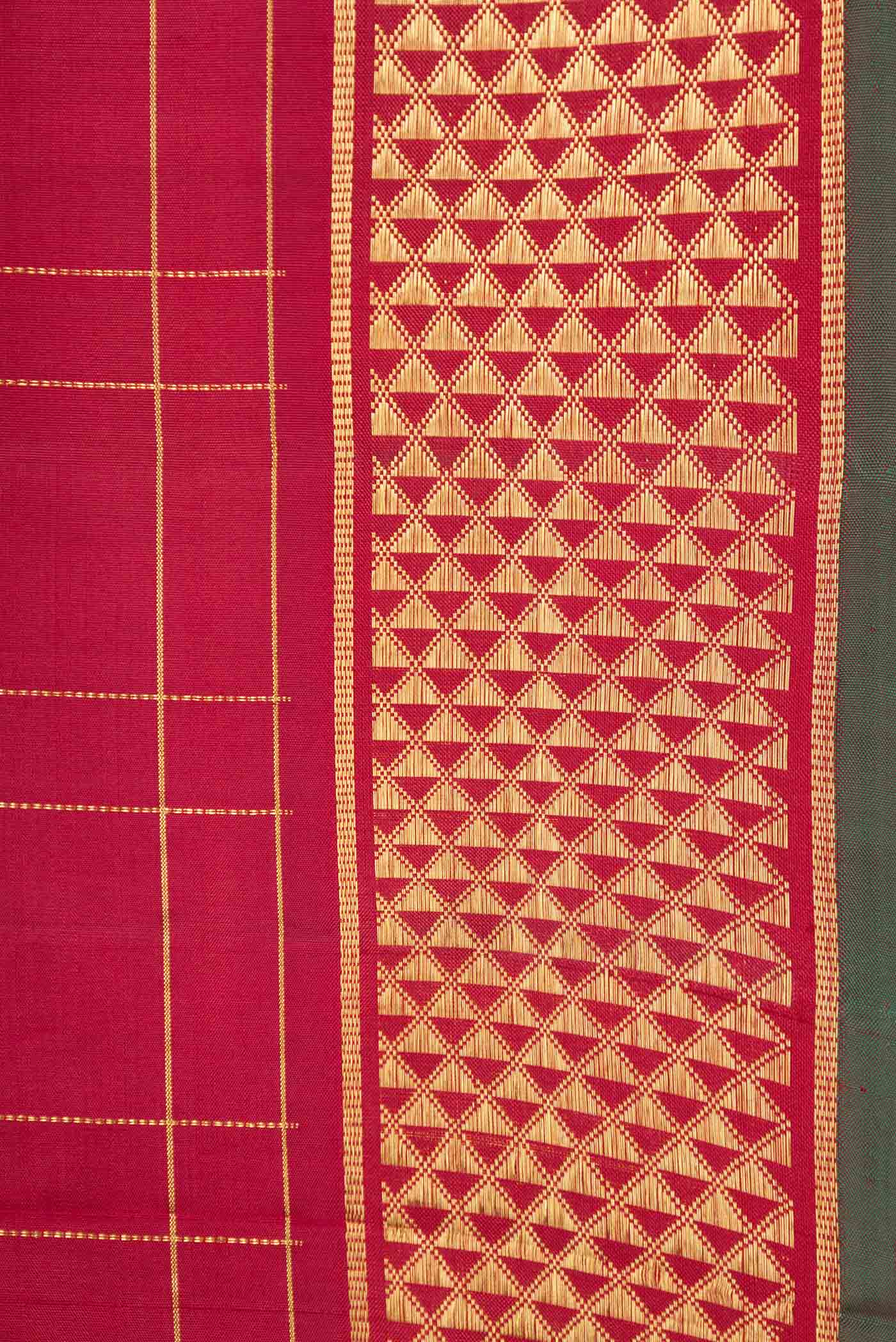 Border image of Maroon Dual Tone Kanchipuram Silk Saree with Zari Butta on the body and Zari Border
