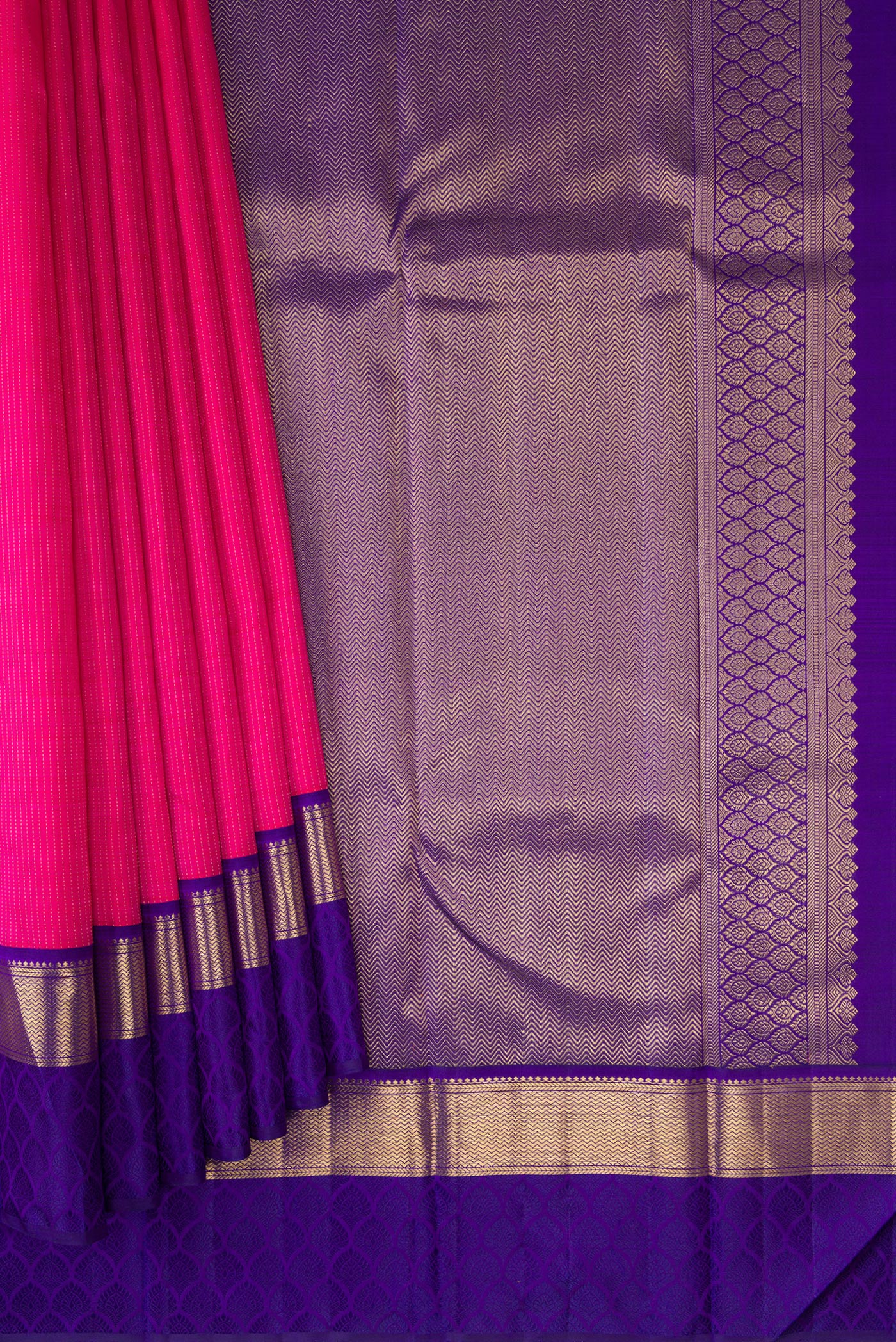 Pleats and pallu of Pure Silk Pure Zari Dark Pink Dual Tone Kanchipuram Saree with Zari Butta on the body and Zari Border. 