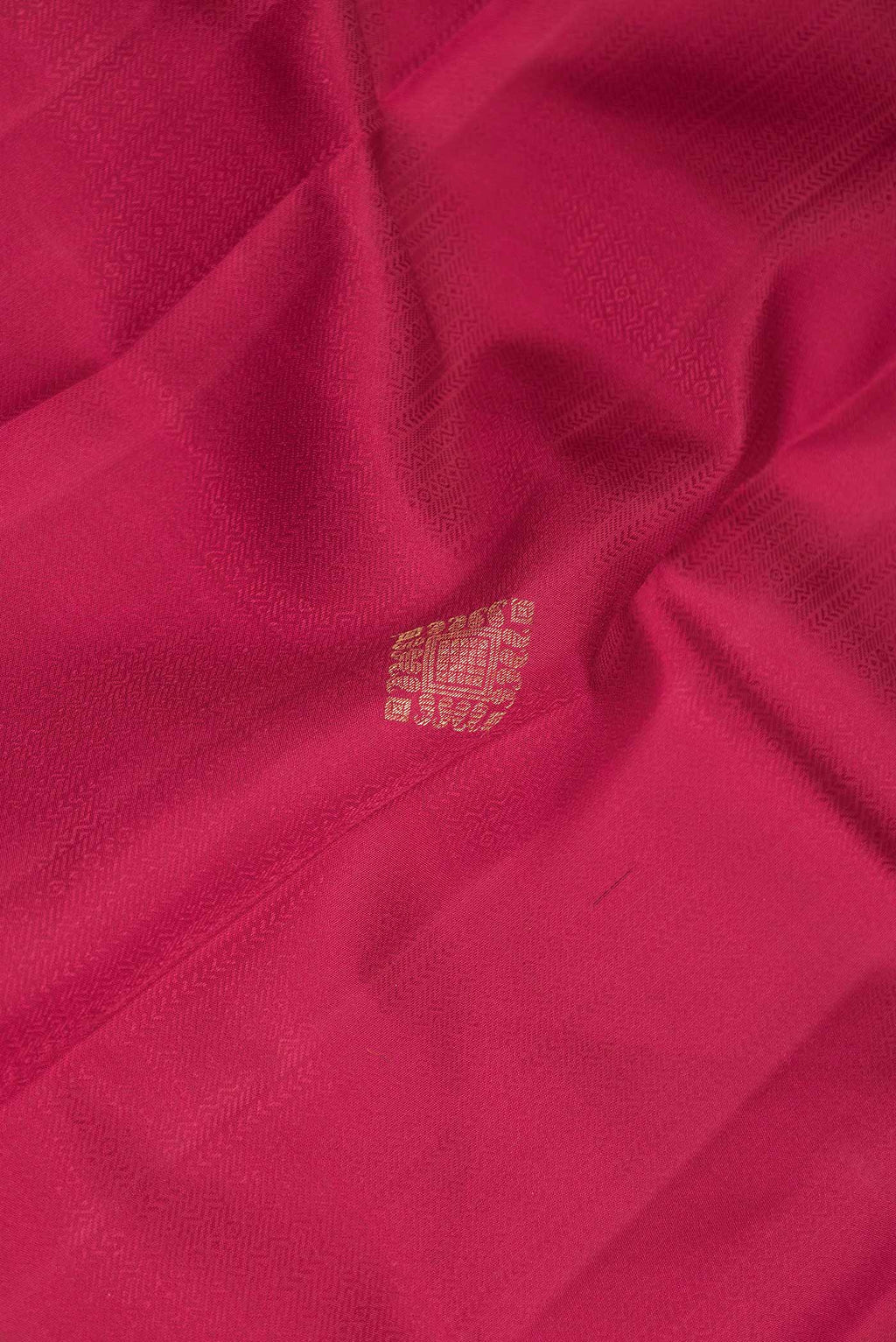Close up of Pure Silk Pure Zari Pink Dual Tone Kanchipuram Saree with Jacquard With Zari Butta on the body and Zari Border displaying folds