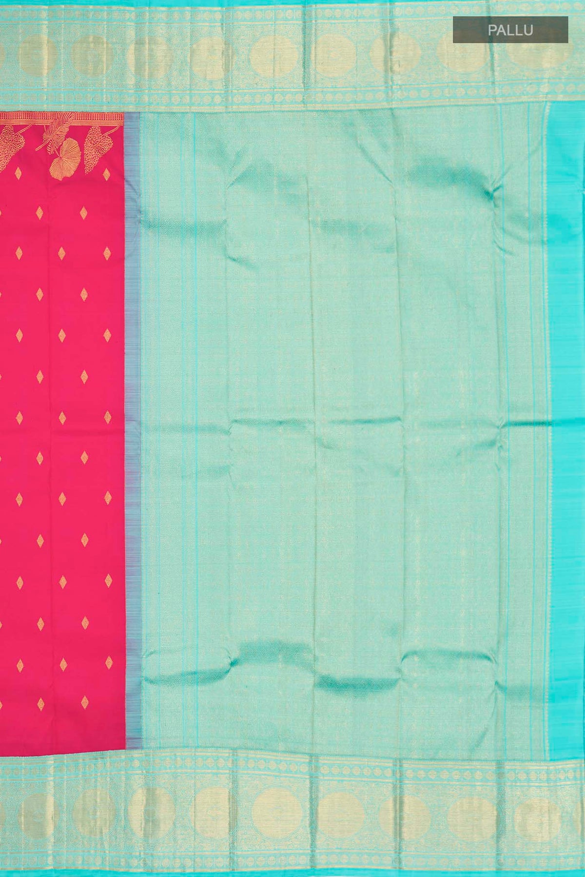 Close up image of the pallu of Pink Kanchipuram Silk Saree with Zari Butta on the body and Zari Border