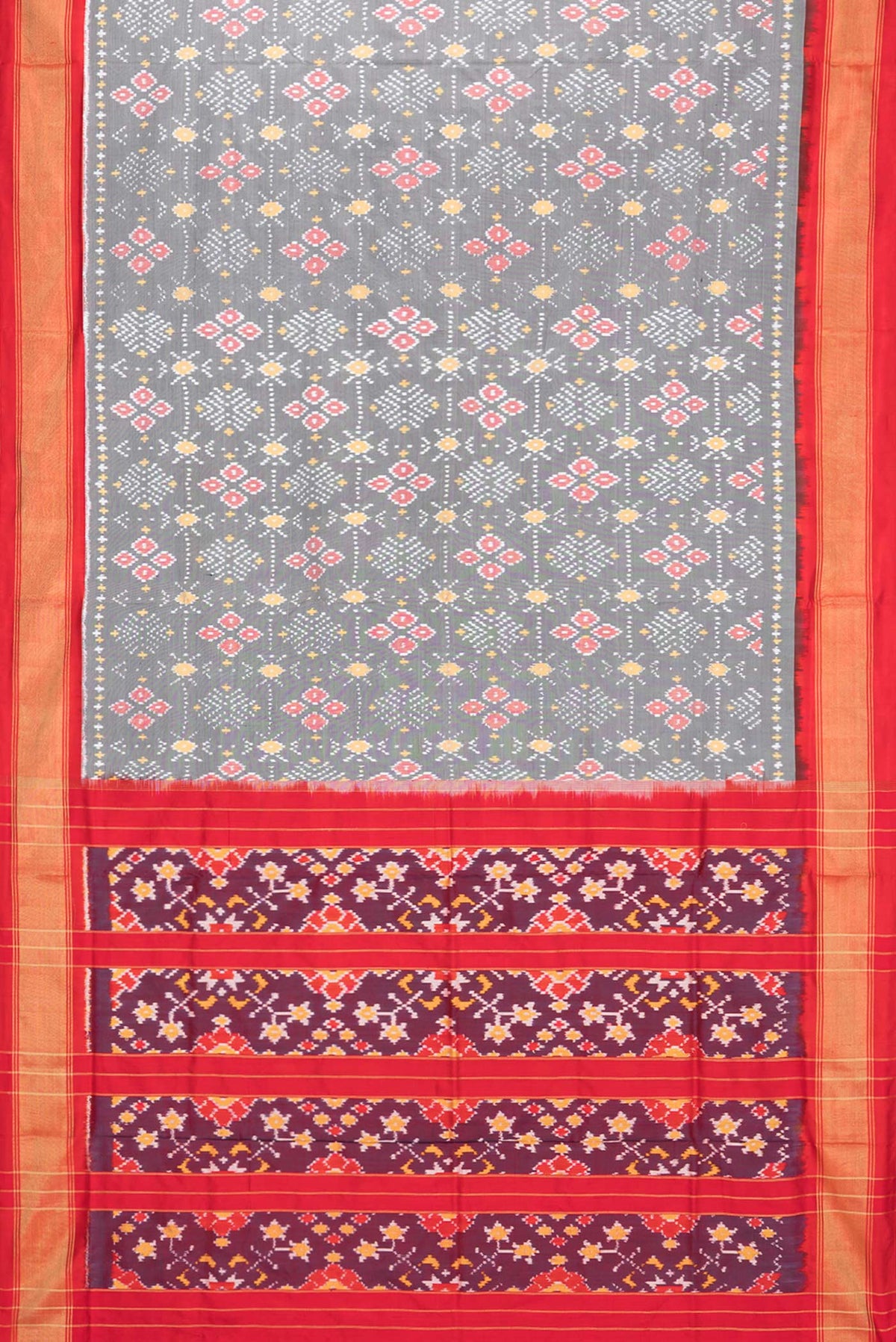 Flat view of Pure Silk Grey Pochampally Saree with Ikat design on the body and Zari Border. 