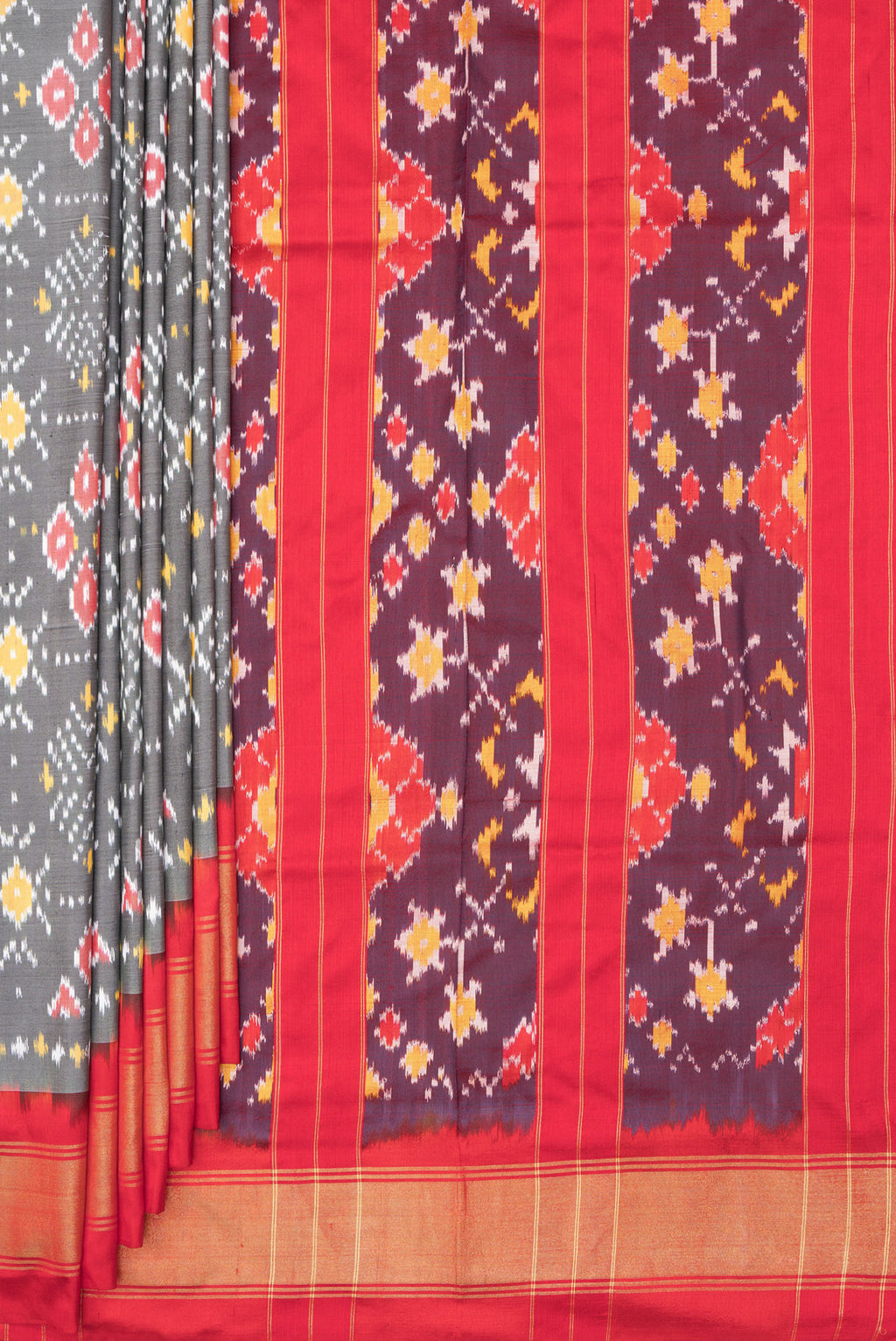 Pleats and pallu of Pure Silk Grey Pochampally Saree with Ikat design on the body and Zari Border. 