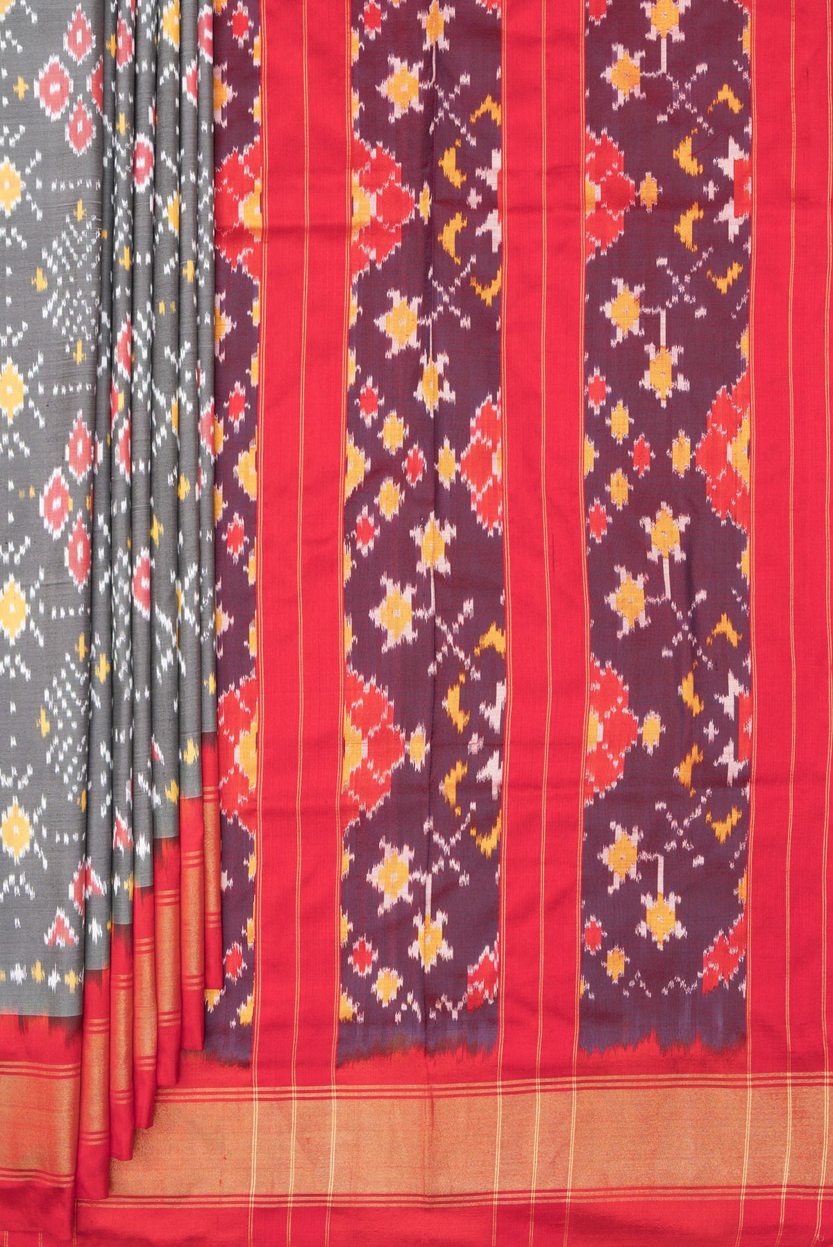 Pleats and pallu of Pure Silk Grey Pochampally Saree with Ikat design on the body and Zari Border. 