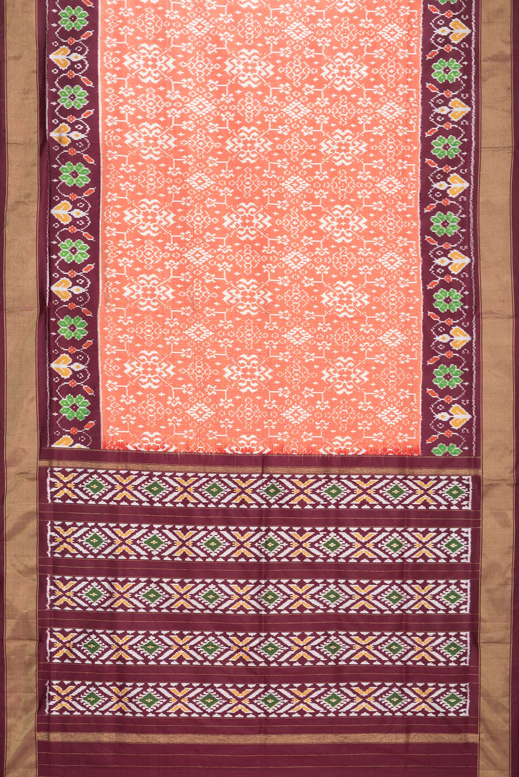 Flat view of Pure Silk Rust Pochampally Saree with Ikat design on the body and Ikat Border. 