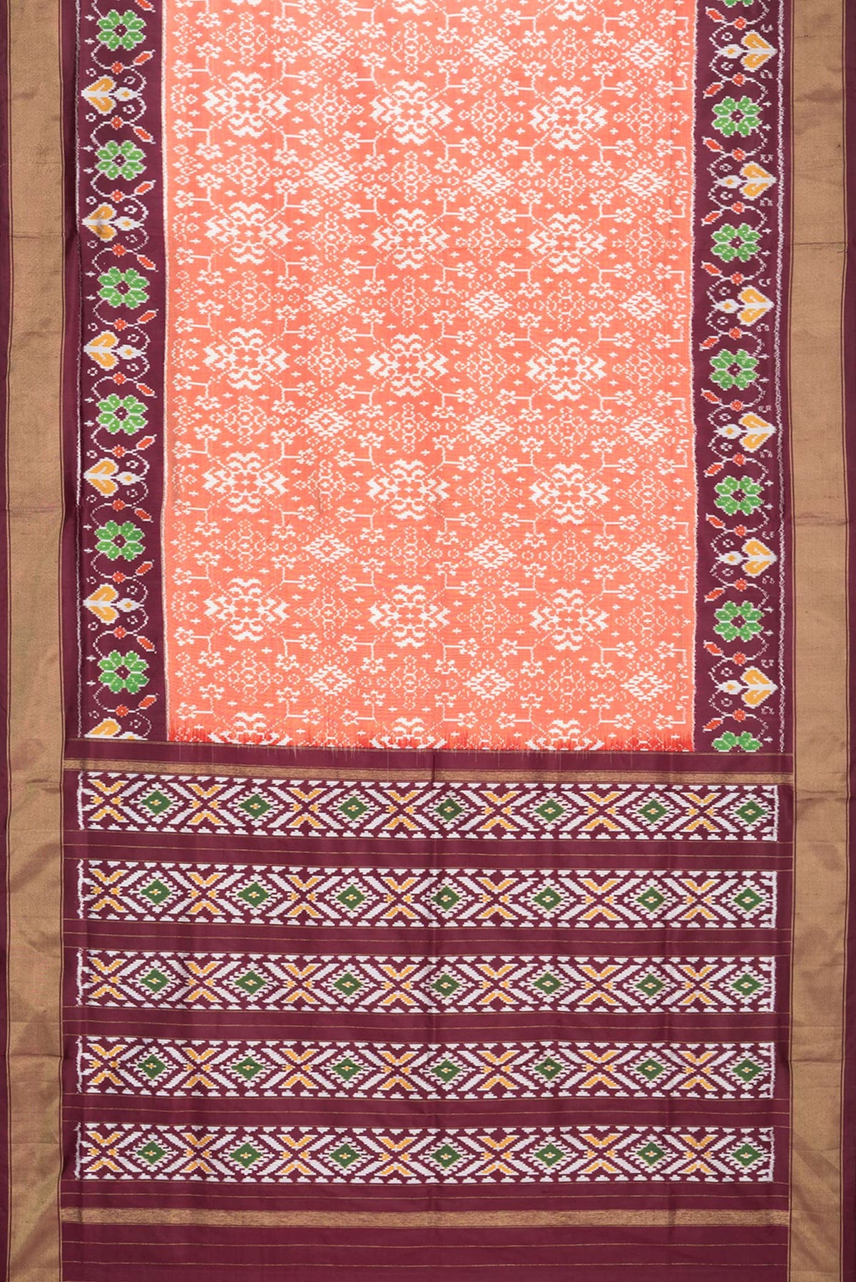 Flat view of Pure Silk Rust Pochampally Saree with Ikat design on the body and Ikat Border. 