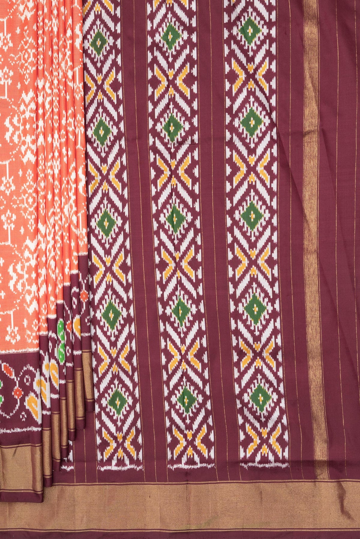 Pleats and pallu of Pure Silk Rust Pochampally Saree with Ikat design on the body and Ikat Border. 