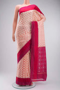 Cream Pochampally Silk Saree with Pure Ikat on the body and Plain Border displayed on a mannequin