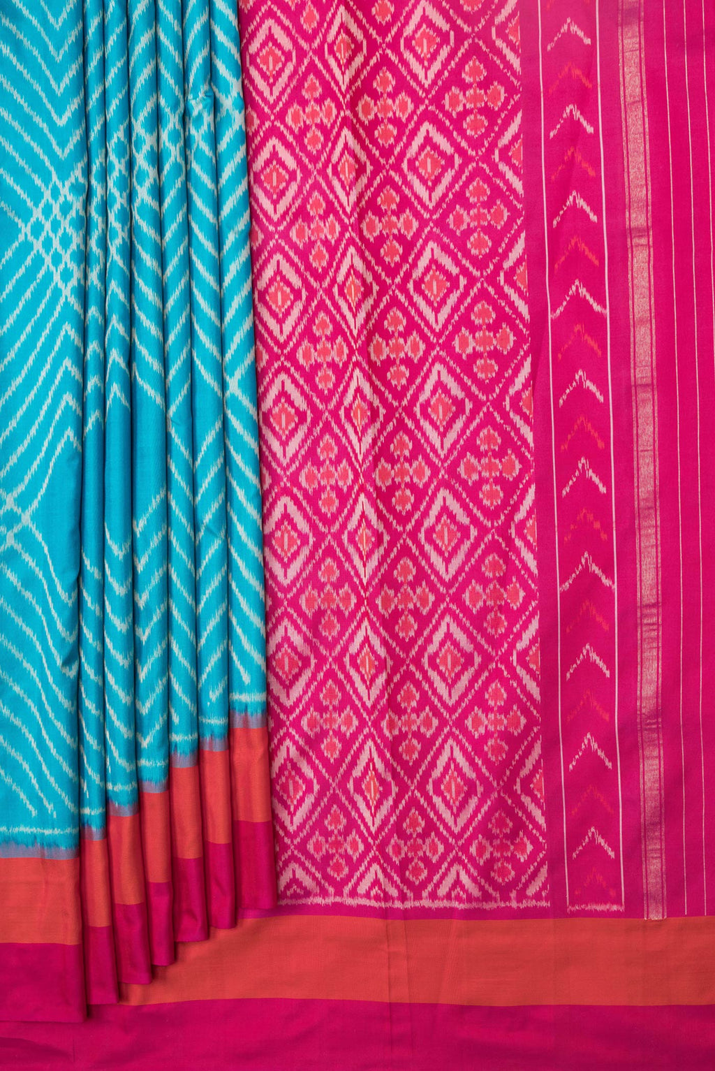 Pleats and pallu of Sky Blue Dual Tone Double Ikat Saree with Ikat Print on the body and Plain Border. 