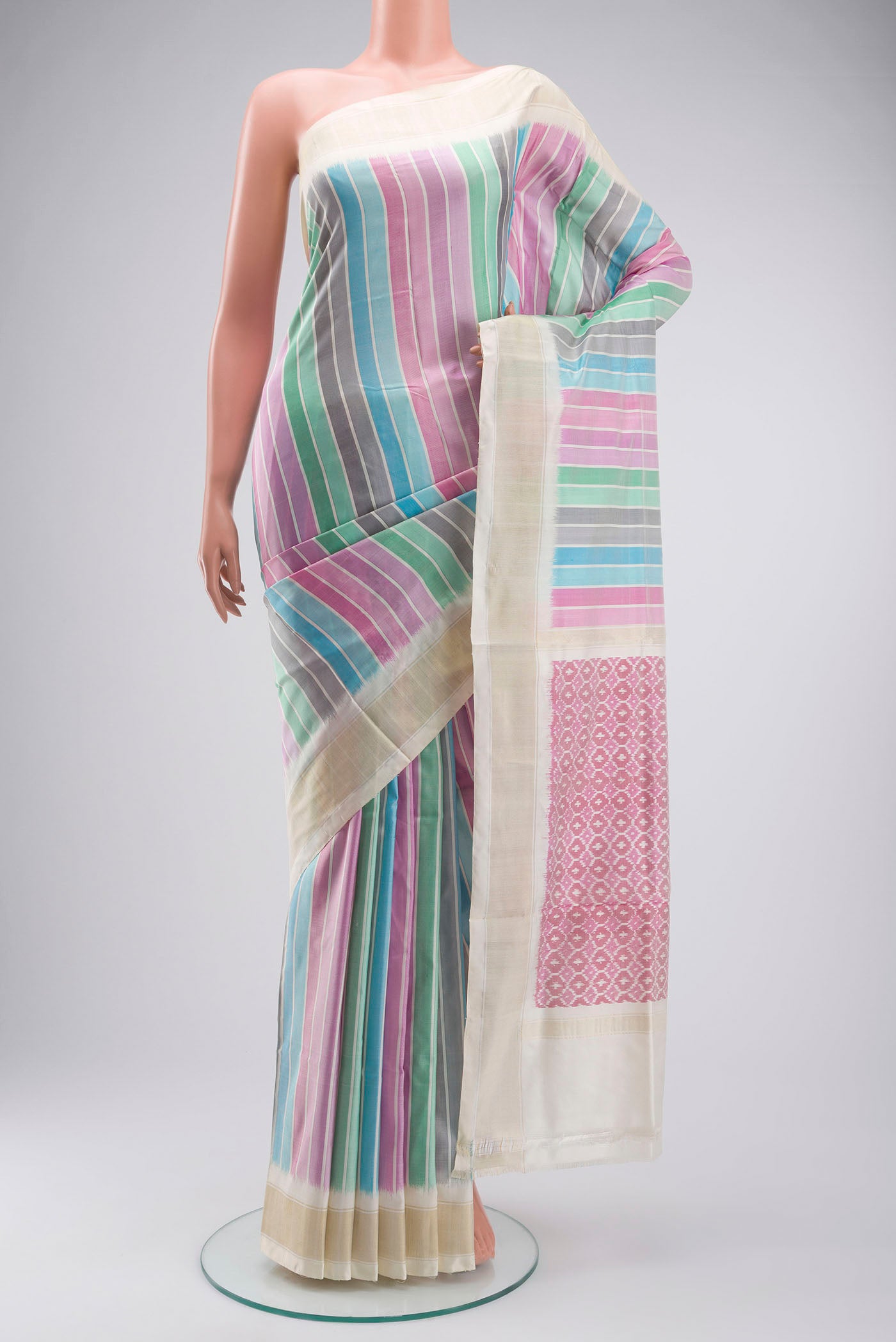 Multi Color Pochampally Silk Saree with Stripes on the body and Zari Border displayed on a mannequin
