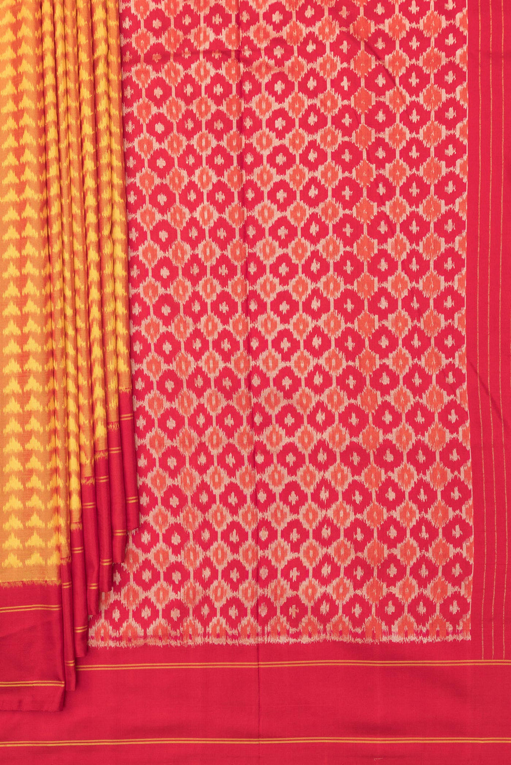 Pleats and pallu of Pure Silk Mustard Pochampally Saree with Pure Ikat on the body and Plain Border. 