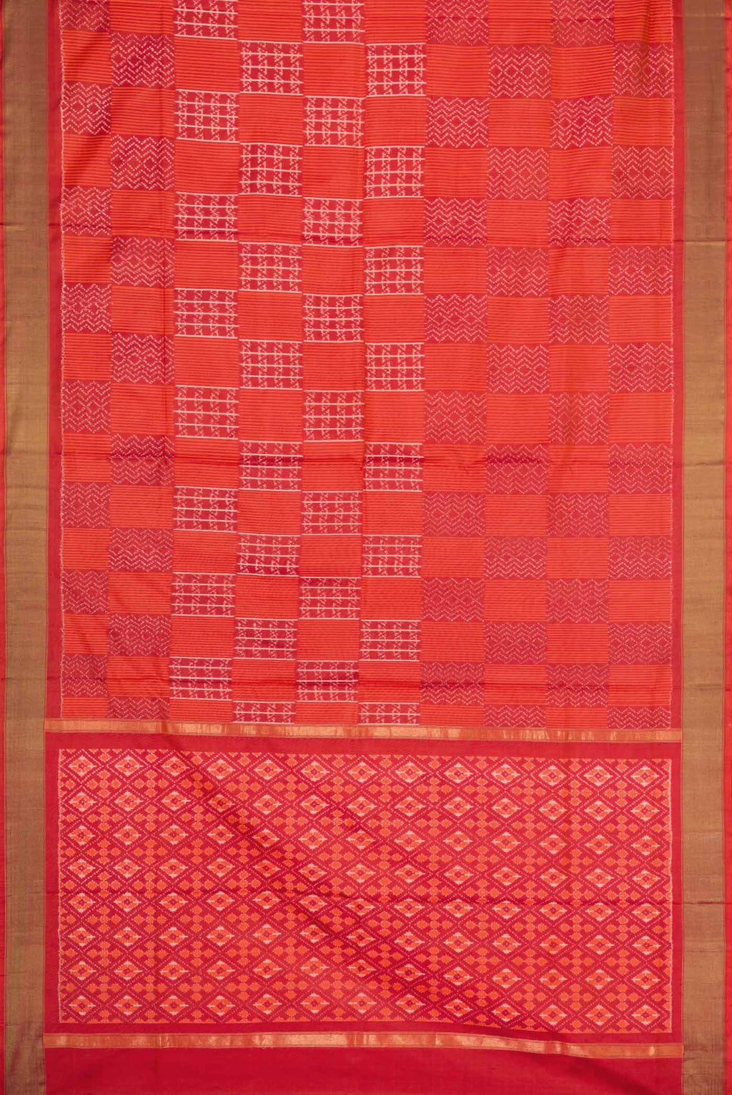 Flat view of Orange Pochampally Silk Saree with Pure Ikat on the body and Zari Border