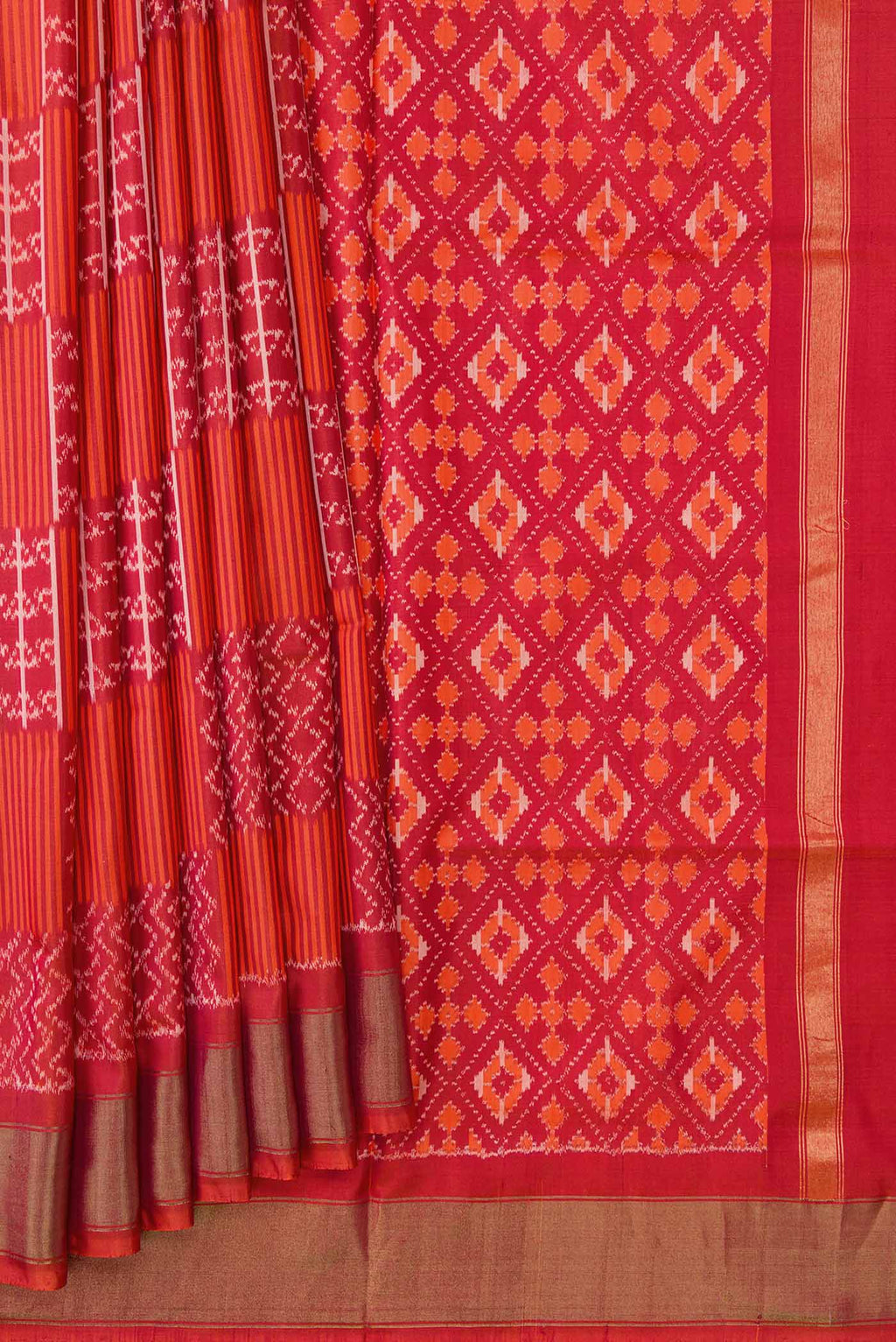 Pleats and pallu of Orange Pochampally Silk Saree with Pure Ikat on the body and Zari Border
