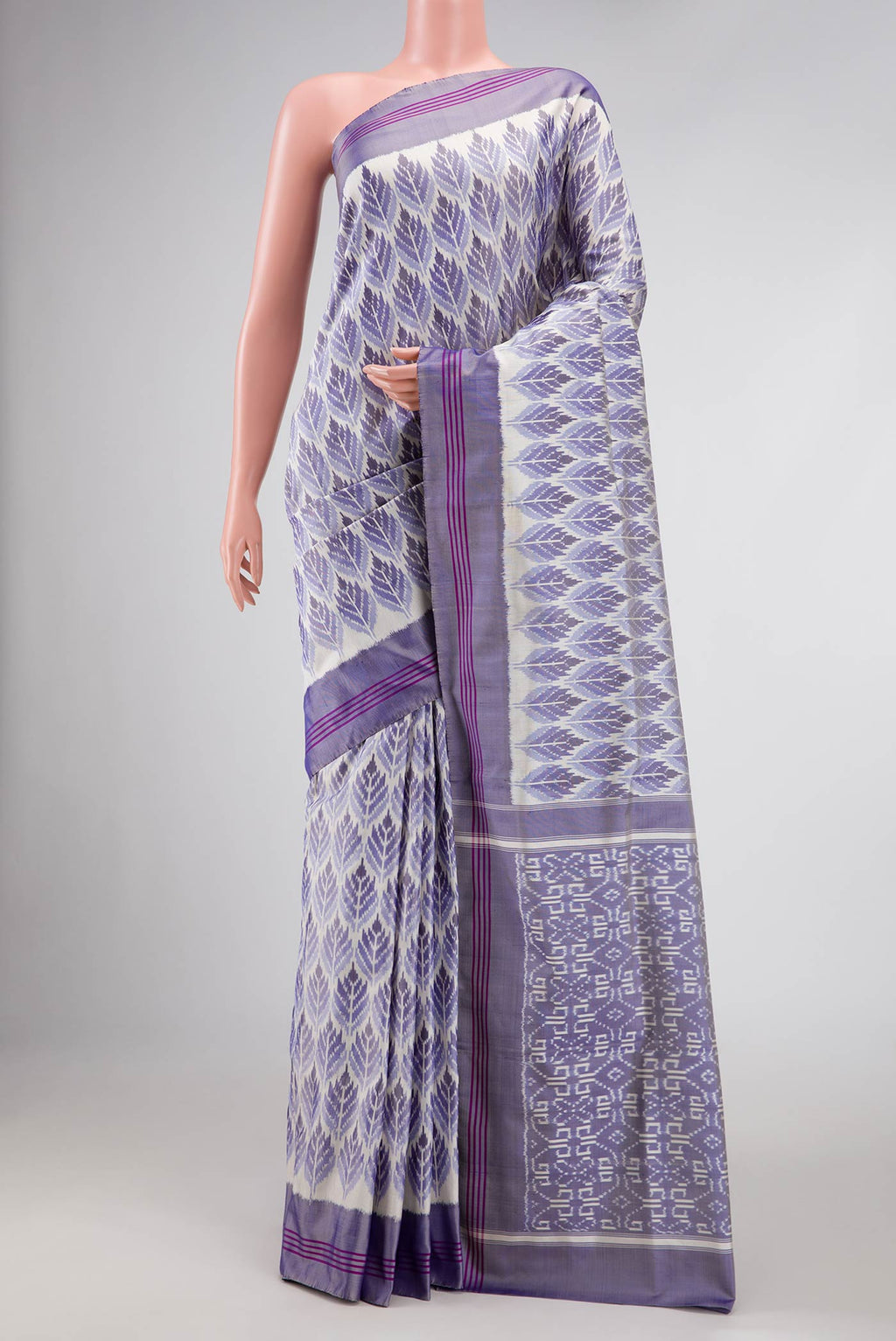 Multi Color Pochampally Silk Saree with Pure Ikat on the body and Plain Border displayed on a mannequin
