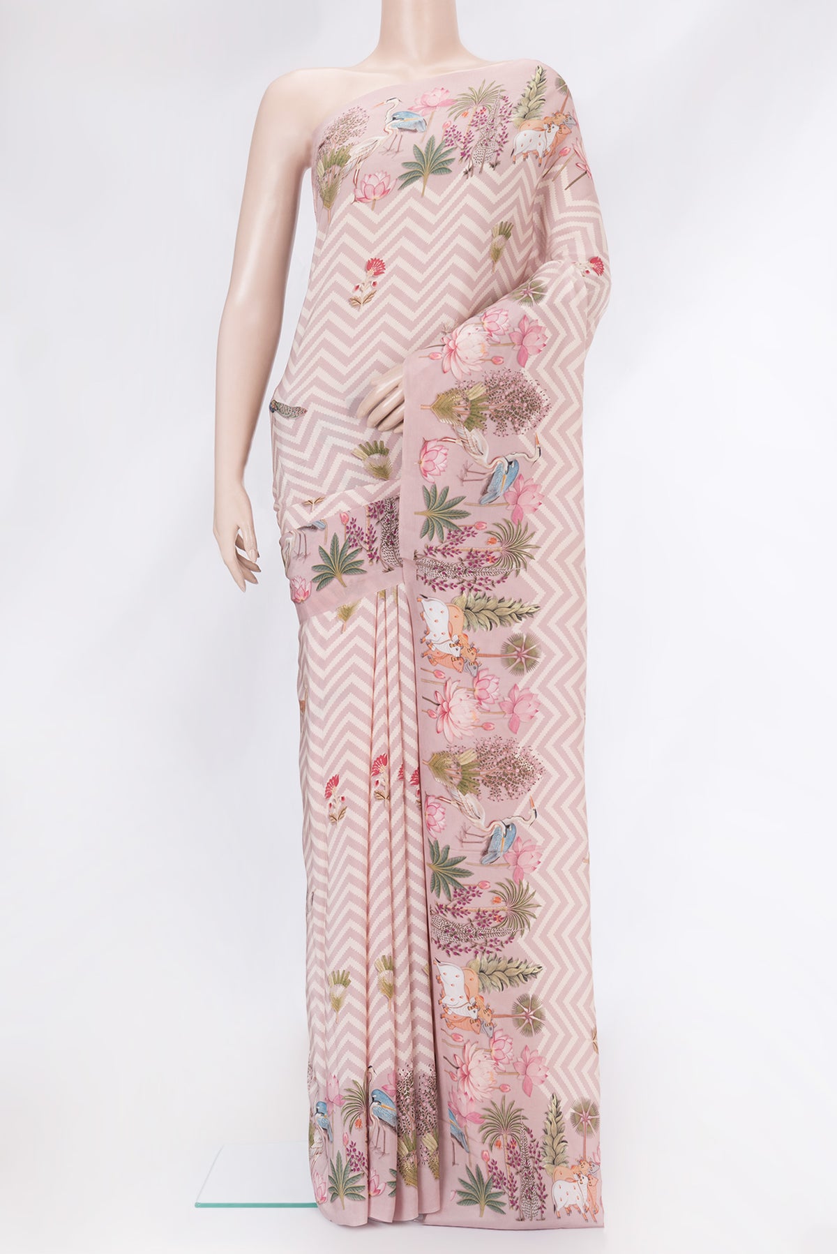 Rose Gold Dual Tone Mysore Crepe Saree with Printed design on the body and Printed Border.  displayed on a mannequin