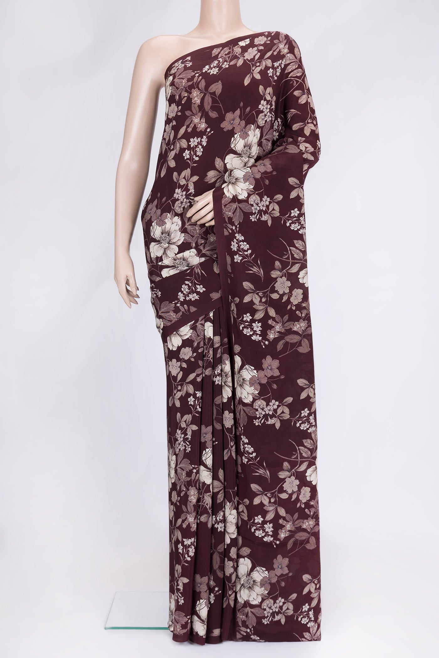 Maroon Dual Tone Mysore Crepe Saree with Printed design on the body and Without Border.  displayed on a mannequin