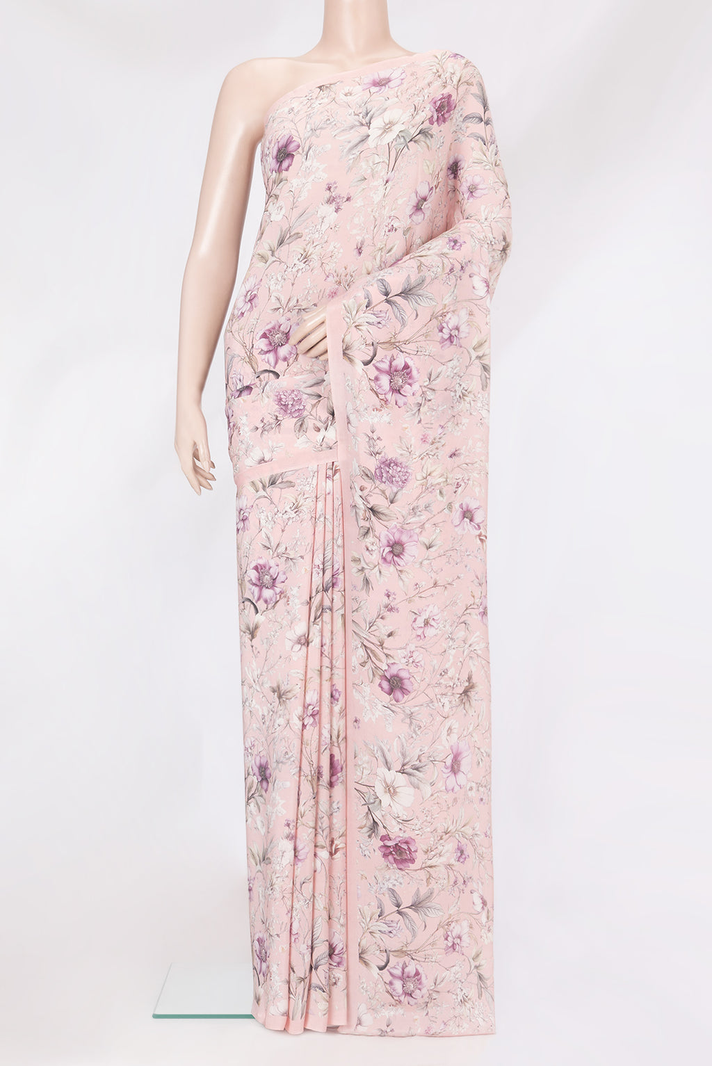 Rose Gold Crepe Saree with Floral Print on the body and Without Border.  displayed on a mannequin