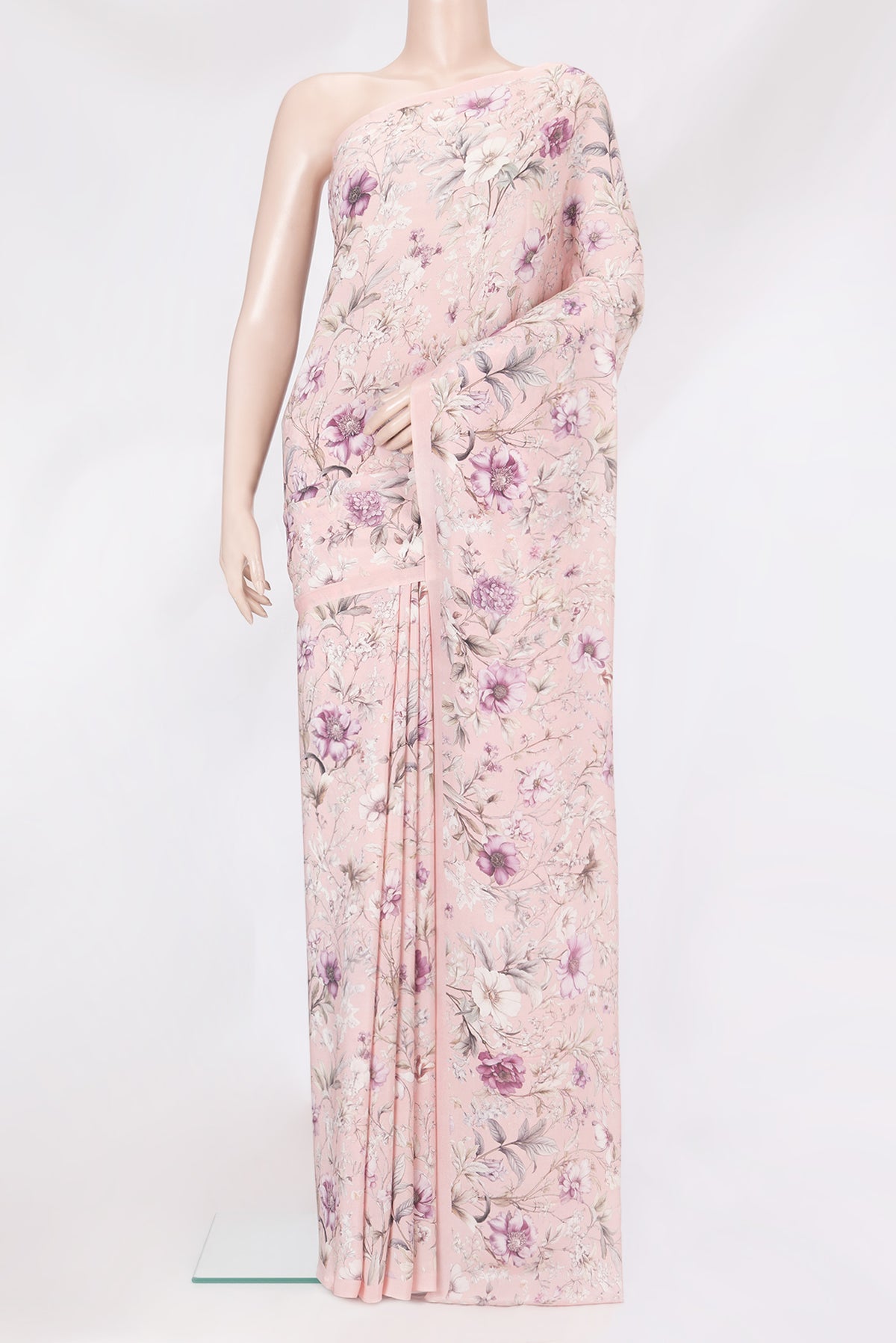 Rose Gold Crepe Saree with Floral Print on the body and Without Border.  displayed on a mannequin