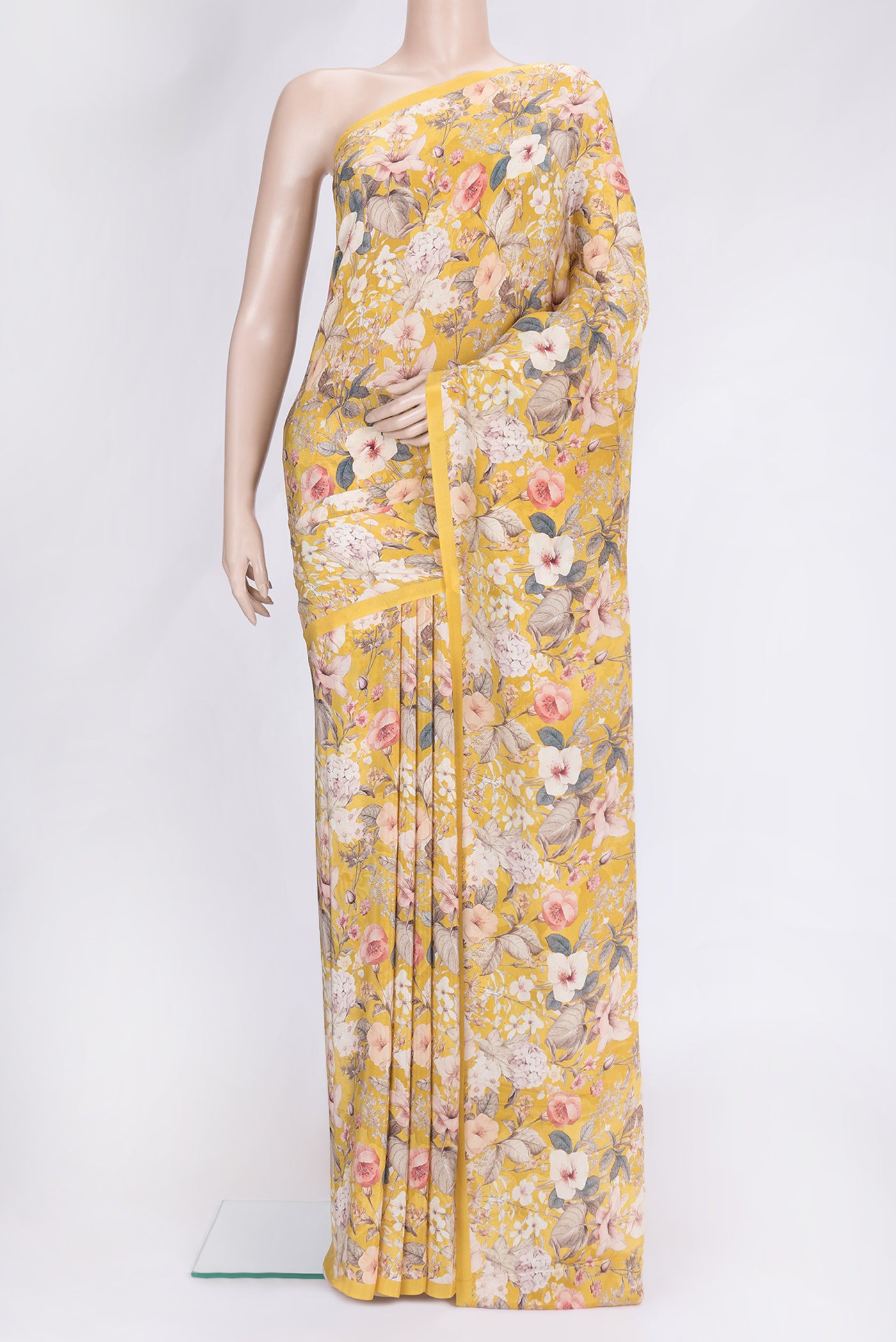 Mustard Dual Tone Mysore Crepe Saree with Printed design on the body and Plain Border.  displayed on a mannequin