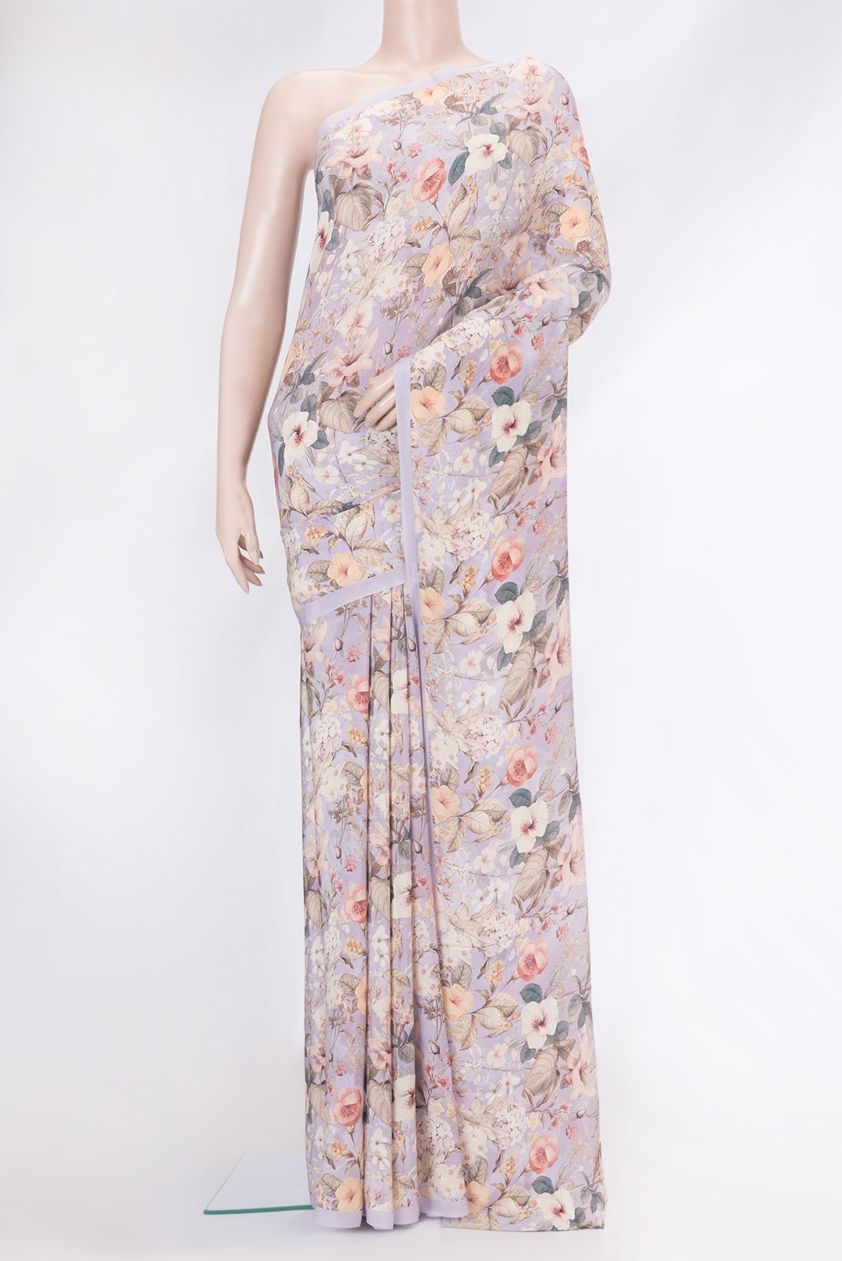 Lavender Dual Tone Mysore Crepe Saree with Printed design on the body and Plain Border.  displayed on a mannequin