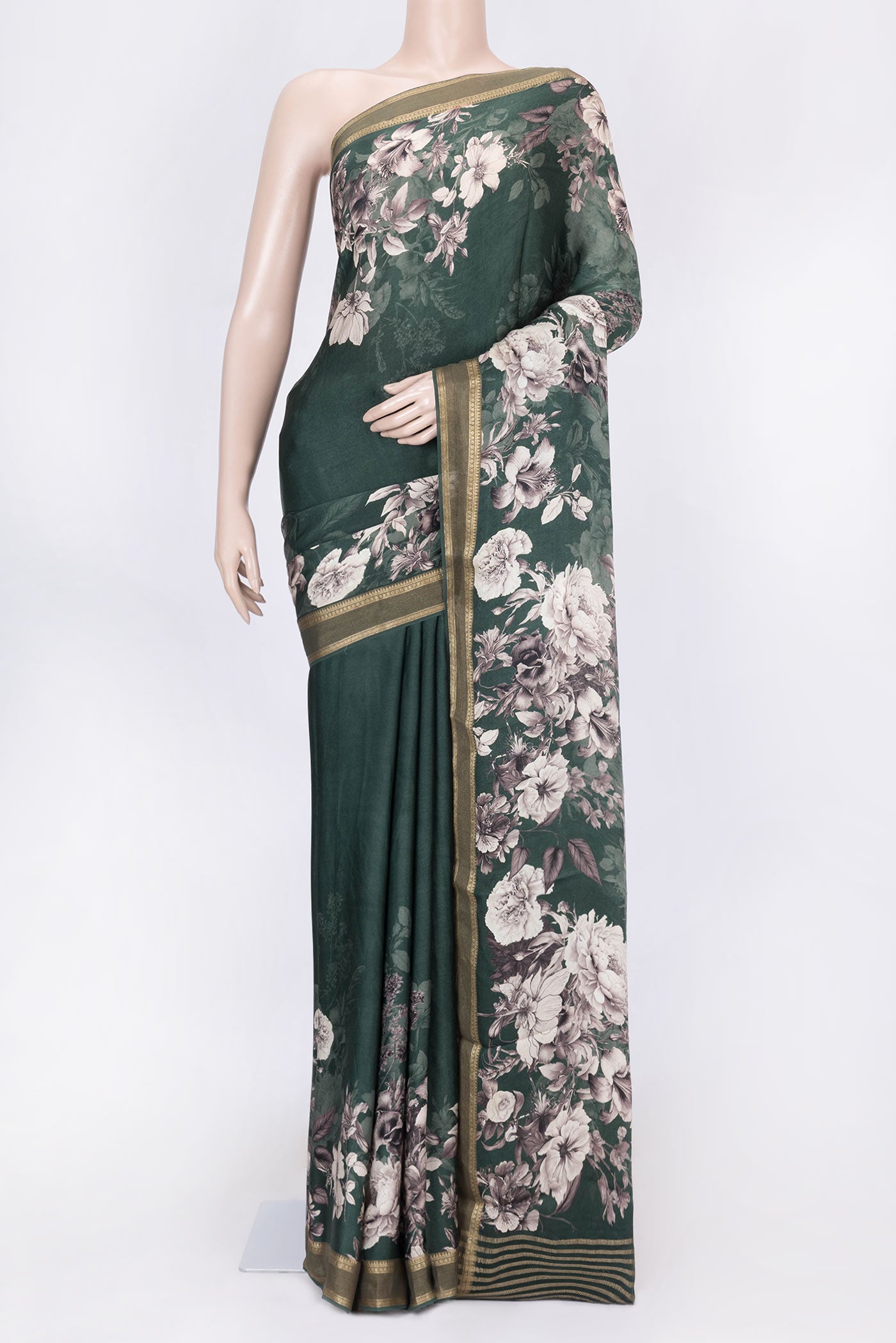 Green Dual Tone Tussar Silk Saree with Printed design on the body and Zari Border displayed on a mannequin