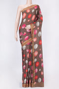 Brown Dual Tone Mysore Crepe Saree with Printed design on the body and Zari Border displayed on a mannequin