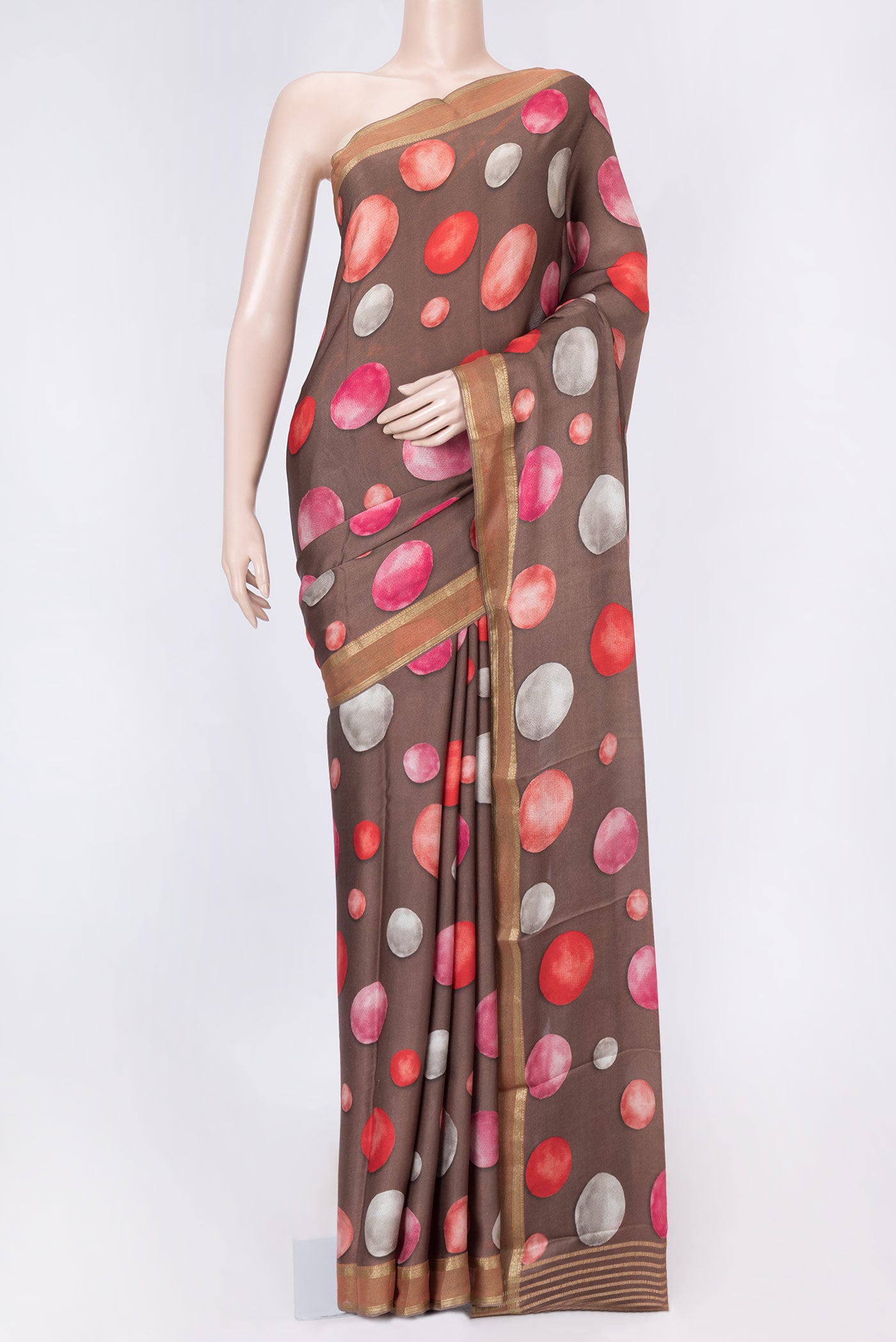 Brown Dual Tone Mysore Crepe Saree with Printed design on the body and Zari Border displayed on a mannequin