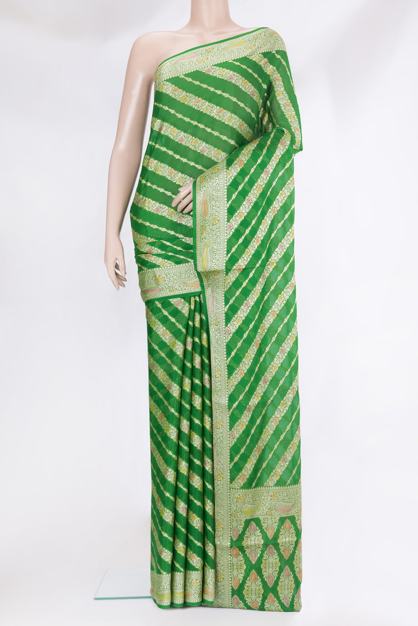 Green Banarasi Georgette Saree with Zari Brocade on the body and Zari Border.  displayed on a mannequin