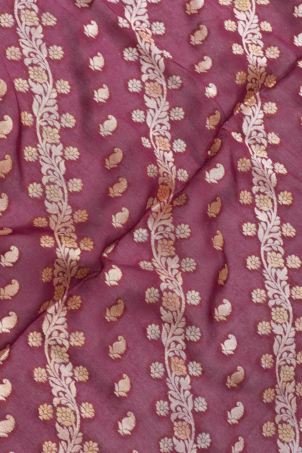 Close up of Maroon Dual Tone Mysore Georgette Saree with Zari Brocade on the body and Thread Border.  displaying folds