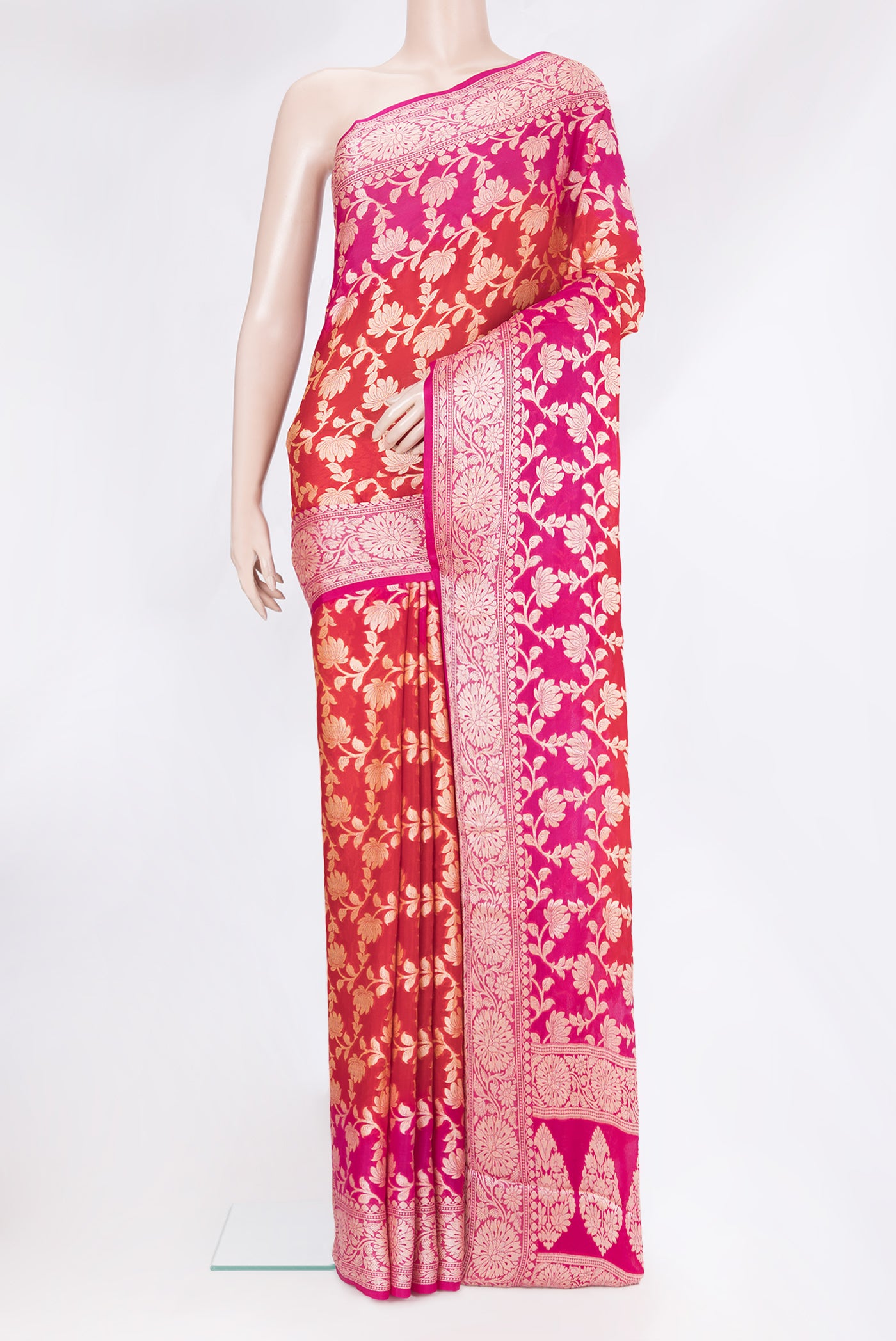 Red Banarasi Georgette Saree with Zari Brocade on the body and Zari Border.  displayed on a mannequin