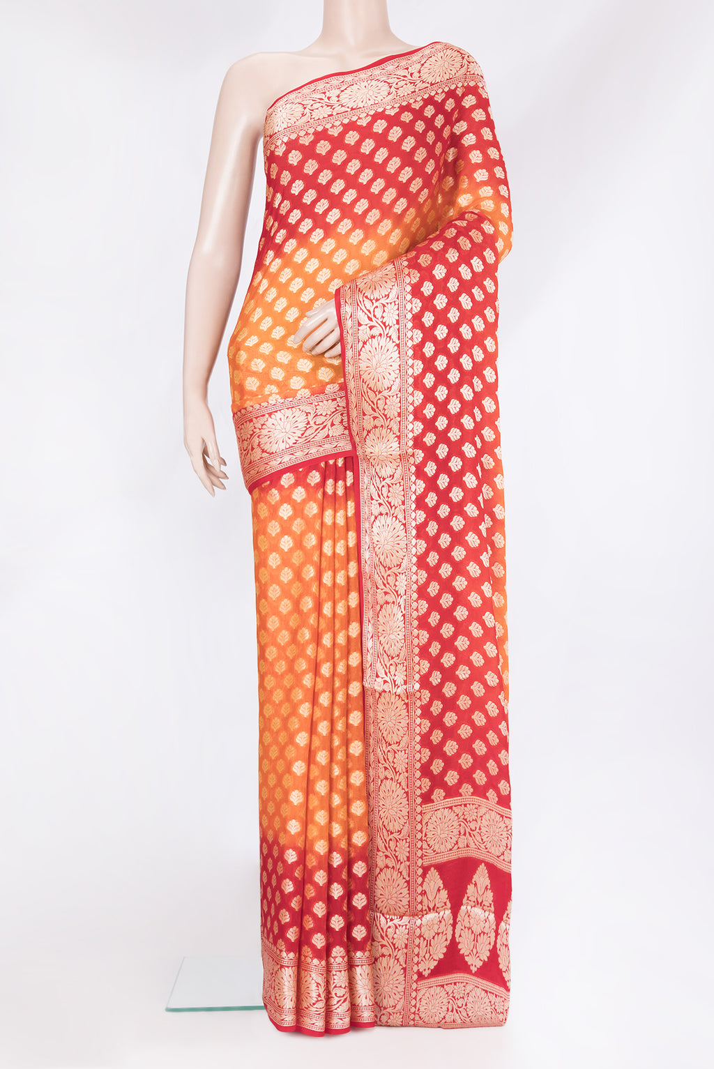 Orange Banarasi Georgette Saree with Zari Brocade on the body and Zari Border.  displayed on a mannequin