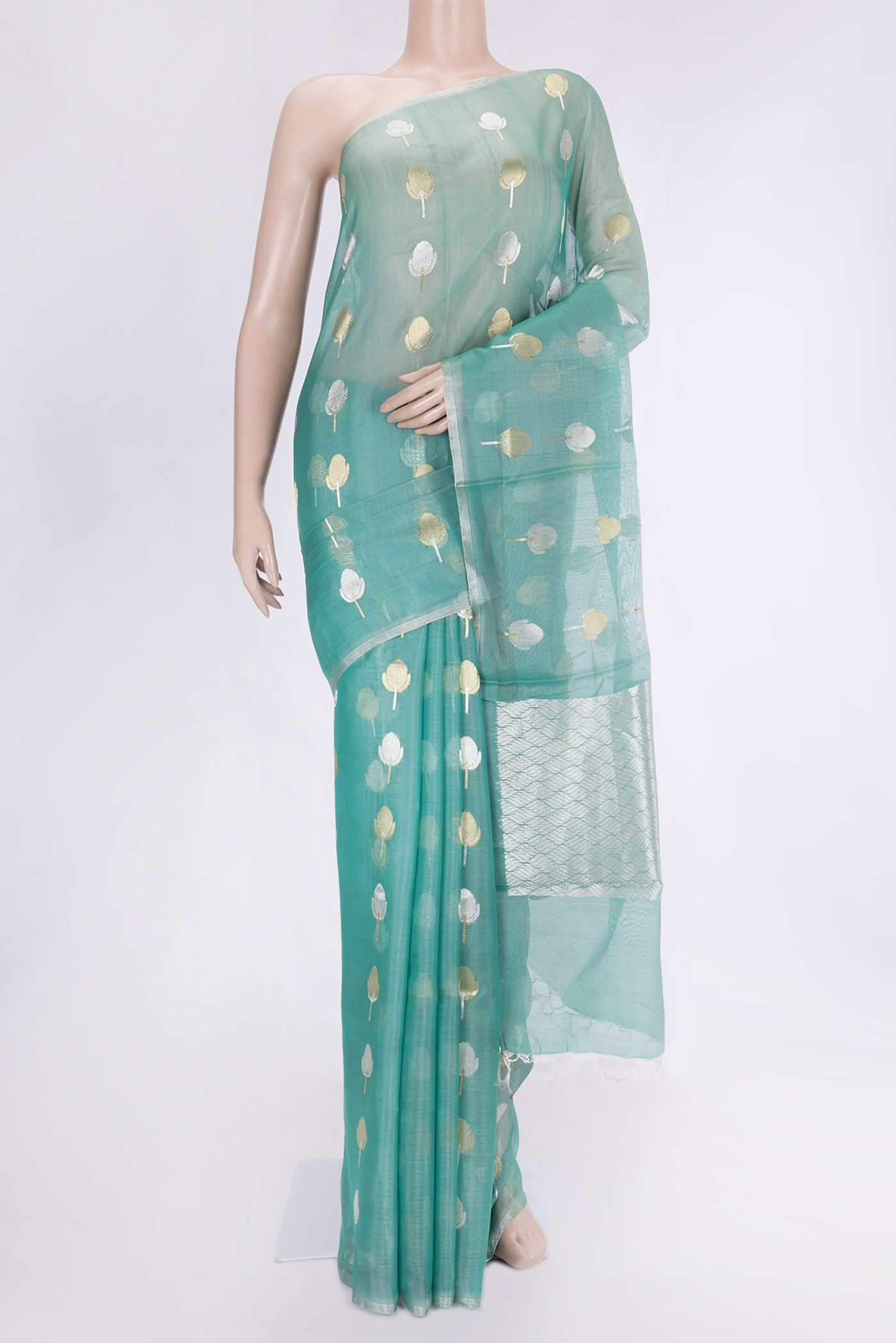 Sea Green Dual Tone Organza Silk Saree with Zari Butta on the body and Zari Border.  displayed on a mannequin