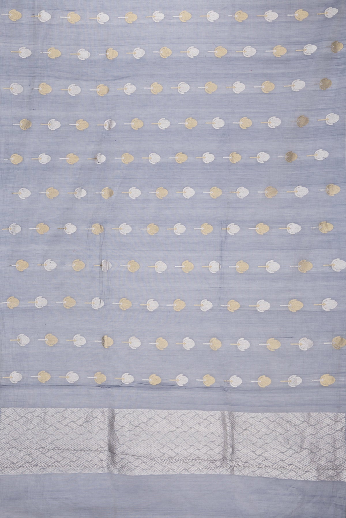 Flat view of Grey Dual Tone Organza Silk Saree with Zari Butta on the body and Zari Border. 