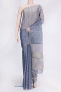 Grey Dual Tone Tussar Silk Saree with Thread Butta on the body and Without Border.  displayed on a mannequin