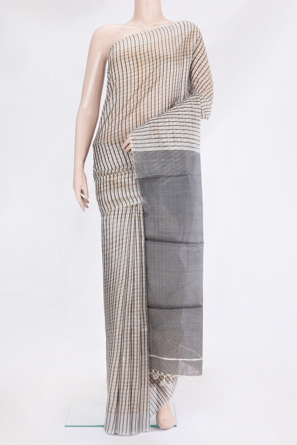 Grey Tussar Silk Saree with Stripes on the body and Without Border.  displayed on a mannequin