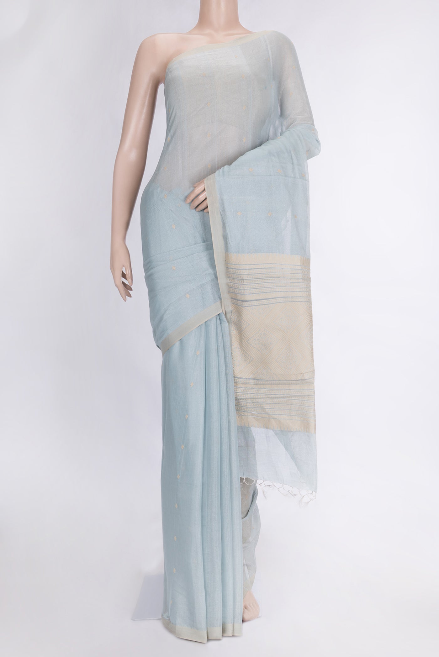 Light Blue Dual Tone Chanderi Tissue Silk Saree with Thread Butta on the body and Plain Border.  displayed on a mannequin