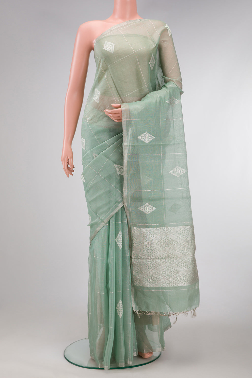 Light Green Dual Tone Chanderi Tissue Silk Saree with Zari Butta on the body and Zari Border.  displayed on a mannequin