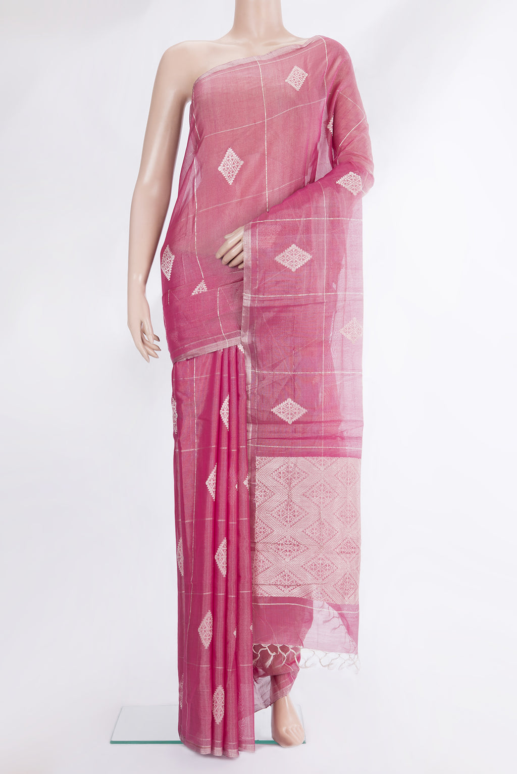 Pink Tussar Saree with Checked design on the body and Zari Border.  displayed on a mannequin
